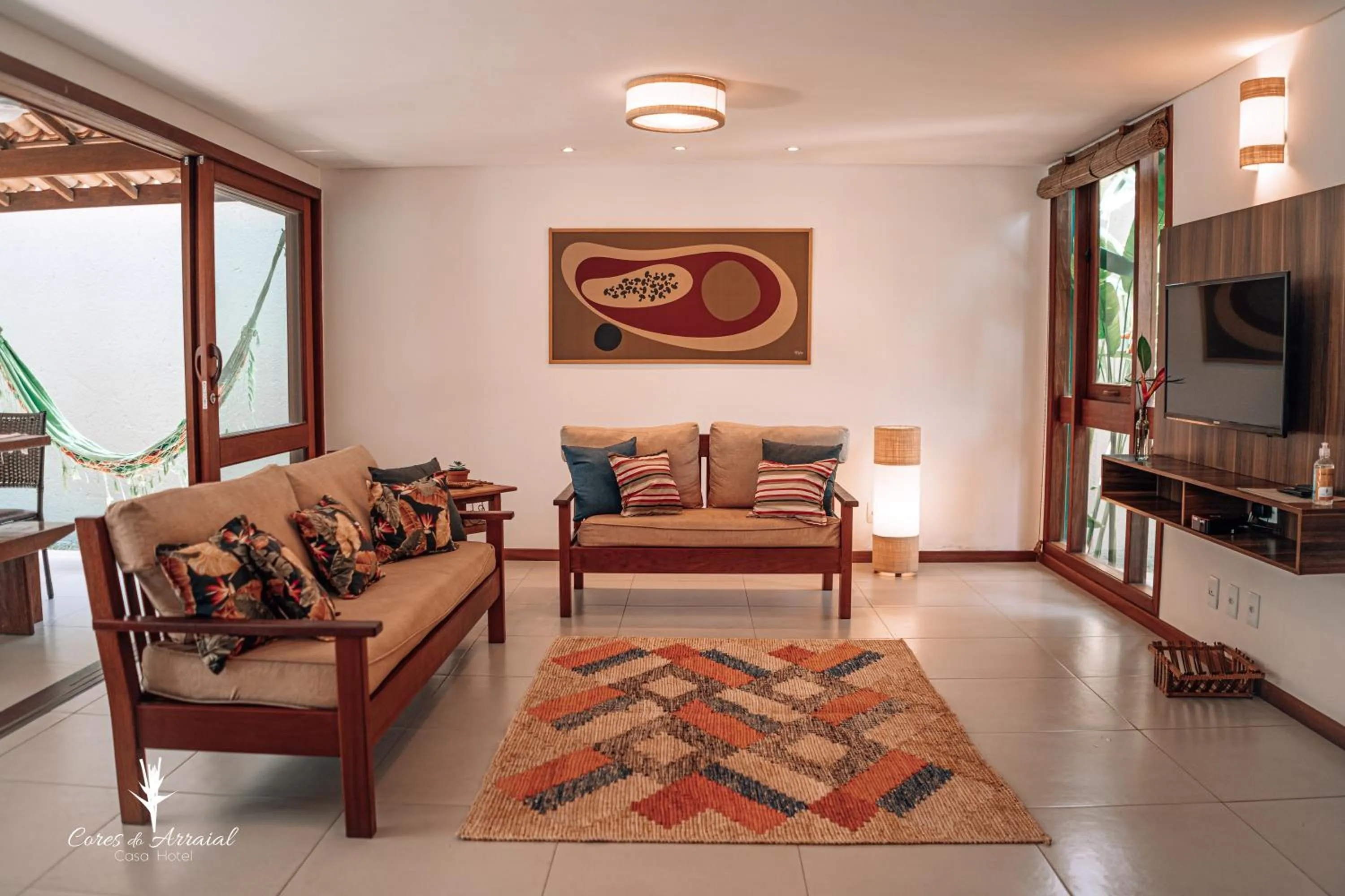 Communal lounge/ TV room in Cores do Arraial Residence Hotel