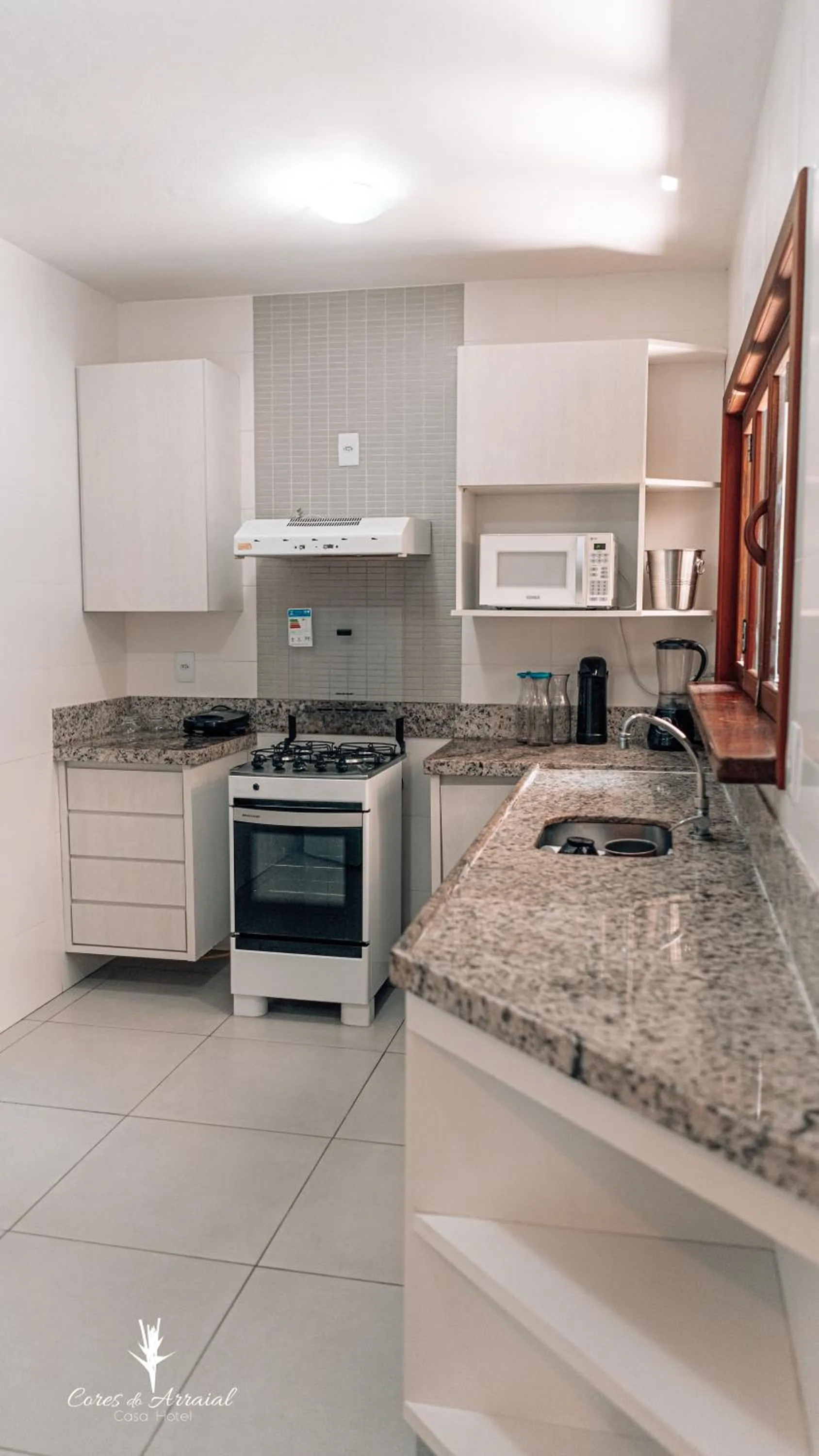 Kitchen or kitchenette in Cores do Arraial Residence Hotel