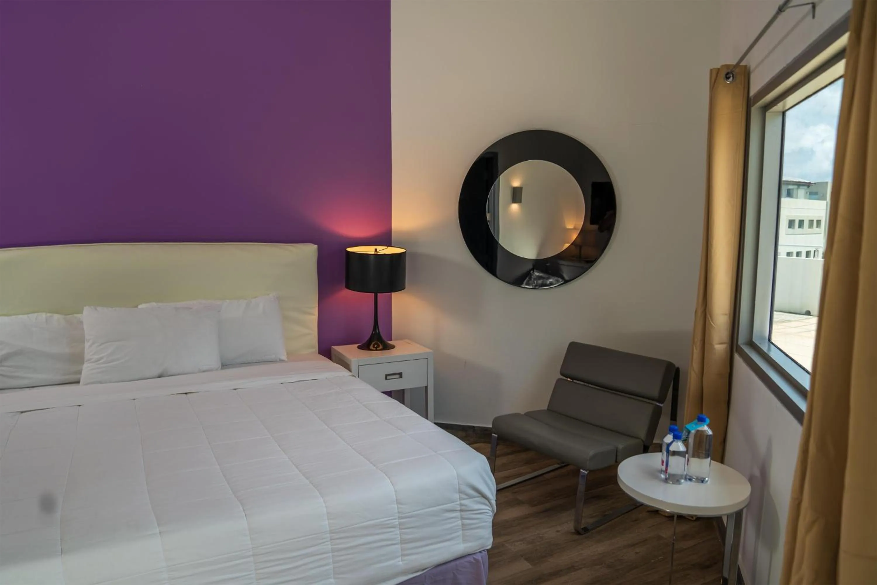 Bedroom, Bed in Commodore Suites, SureStay Collection by Best Western