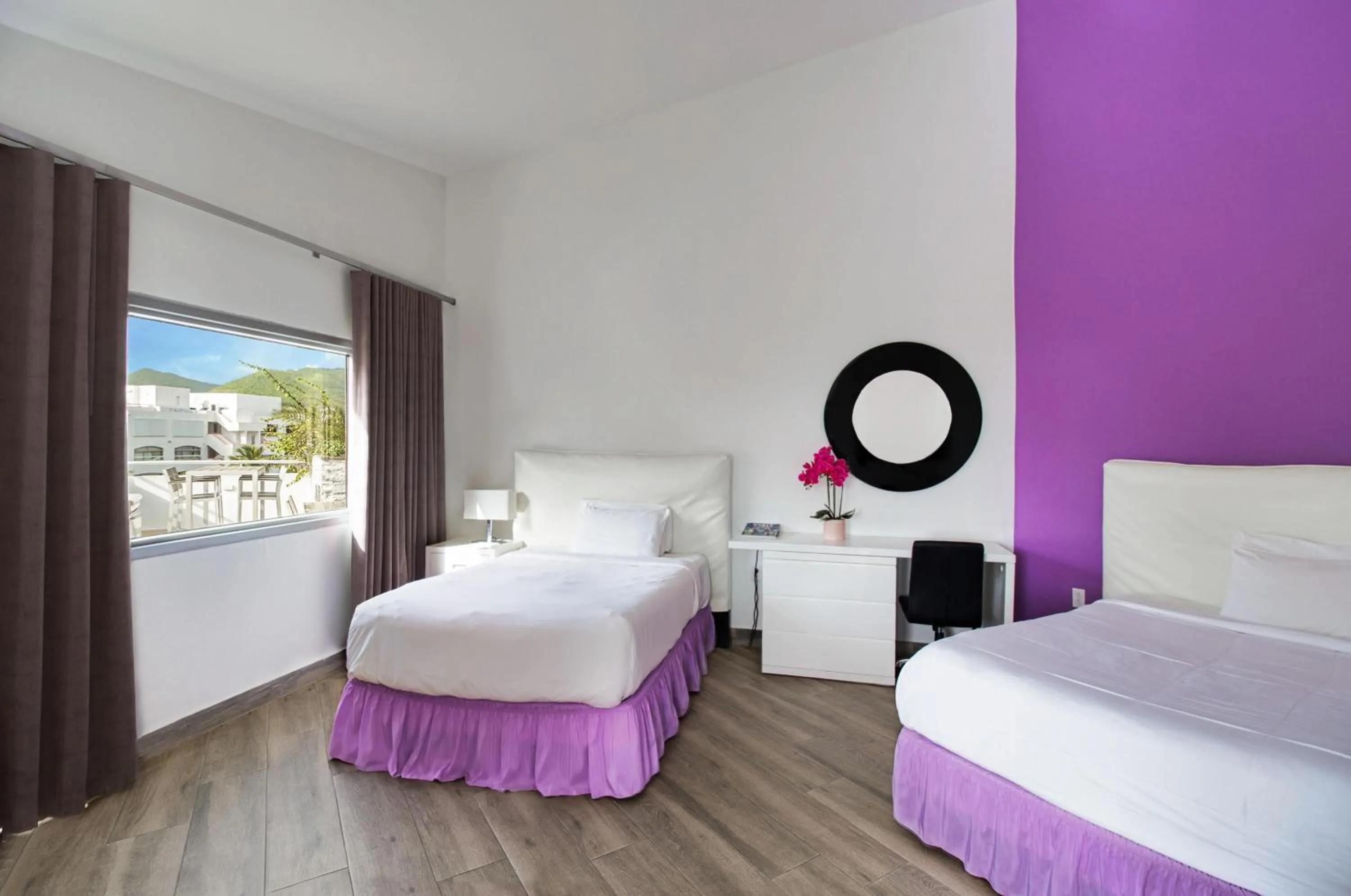 Bedroom, Bed in Commodore Suites, SureStay Collection by Best Western