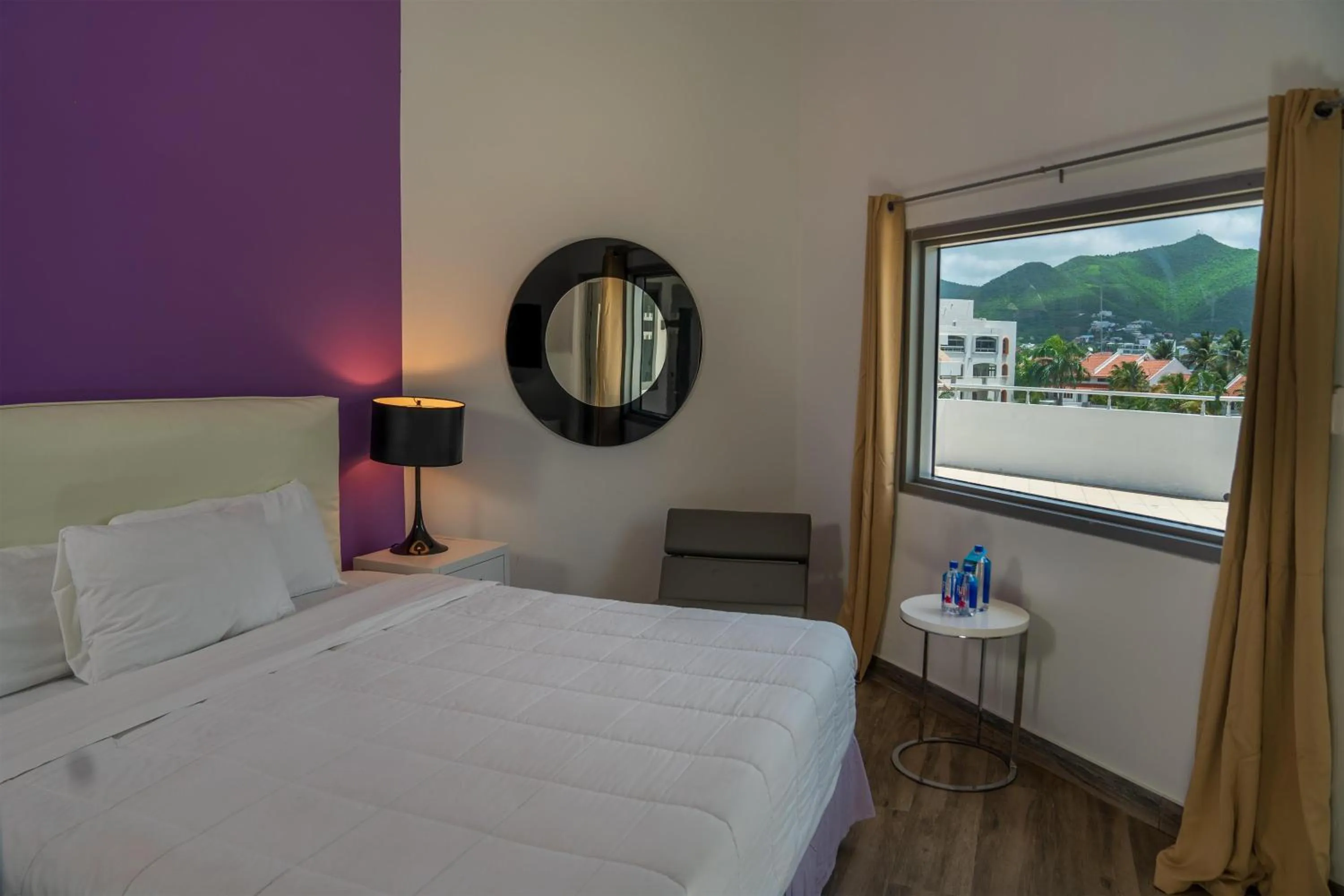 Bedroom, Bed in Commodore Suites, SureStay Collection by Best Western