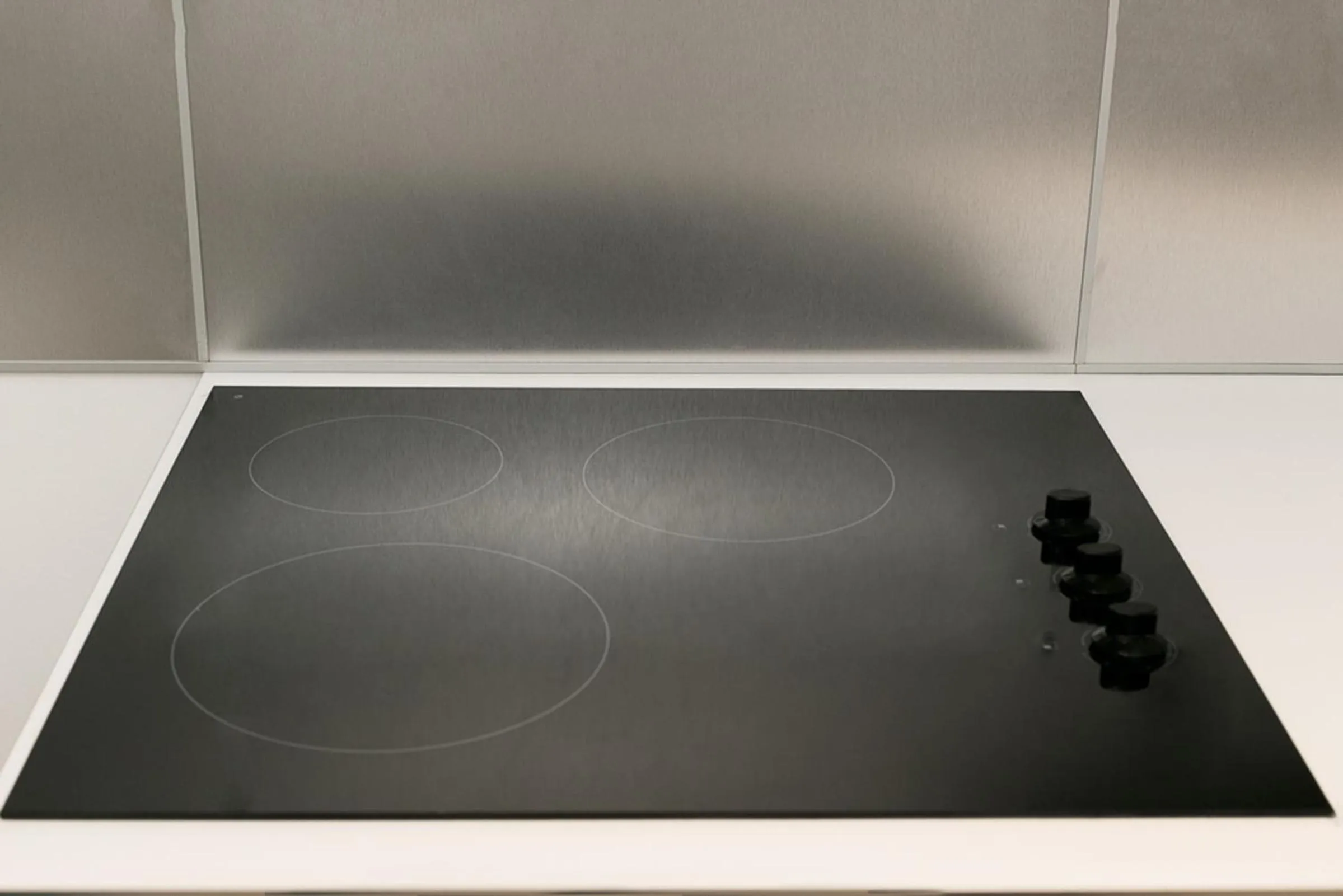 Kitchen or kitchenette in Commodore Suites