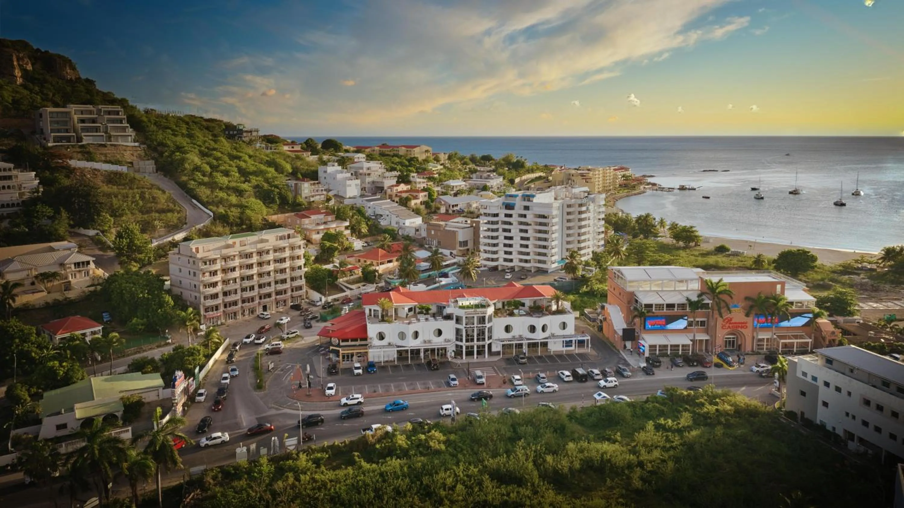 Property building in Commodore Suites, SureStay Collection by Best Western