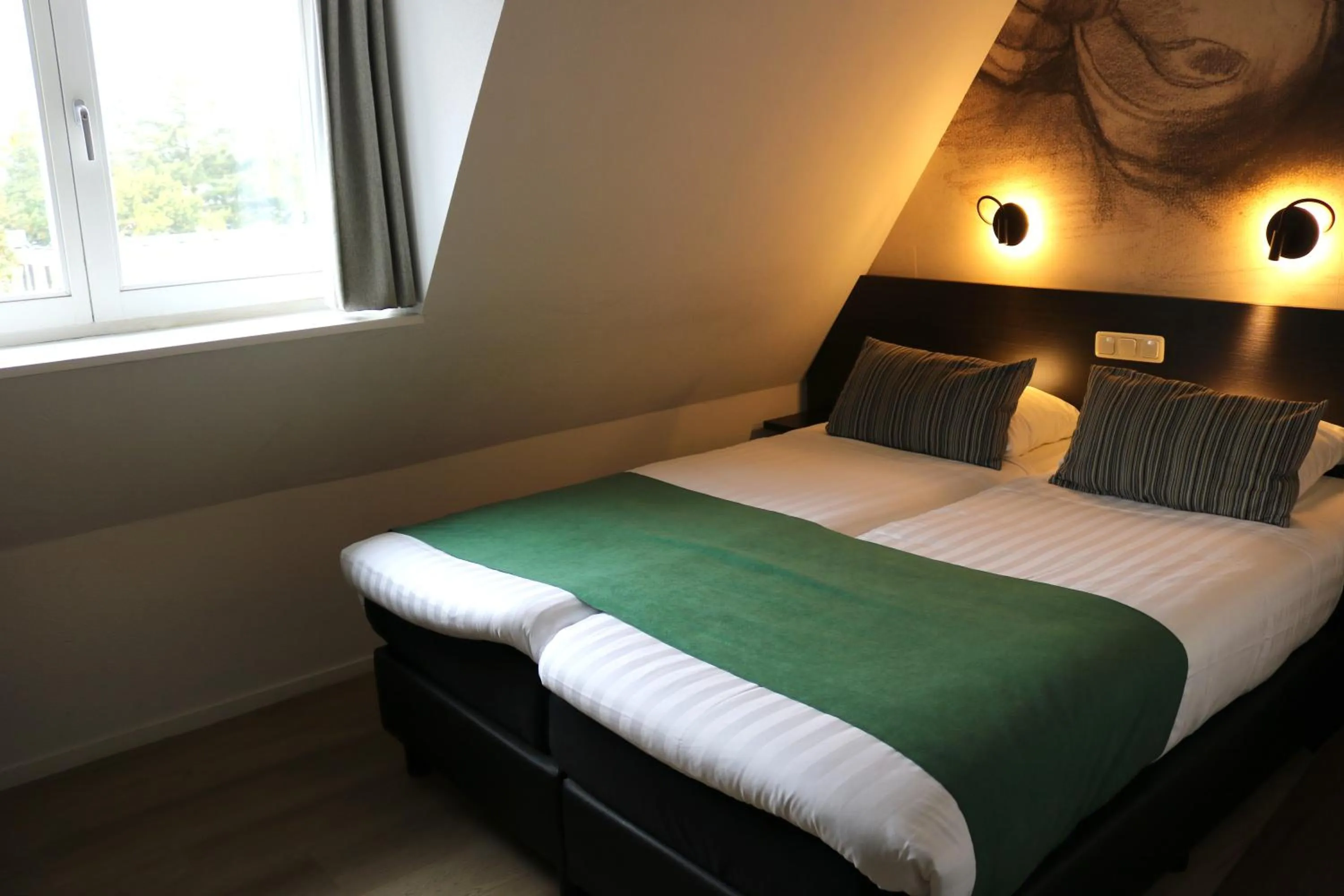 Bed in Parkhotel Auberge Vincent