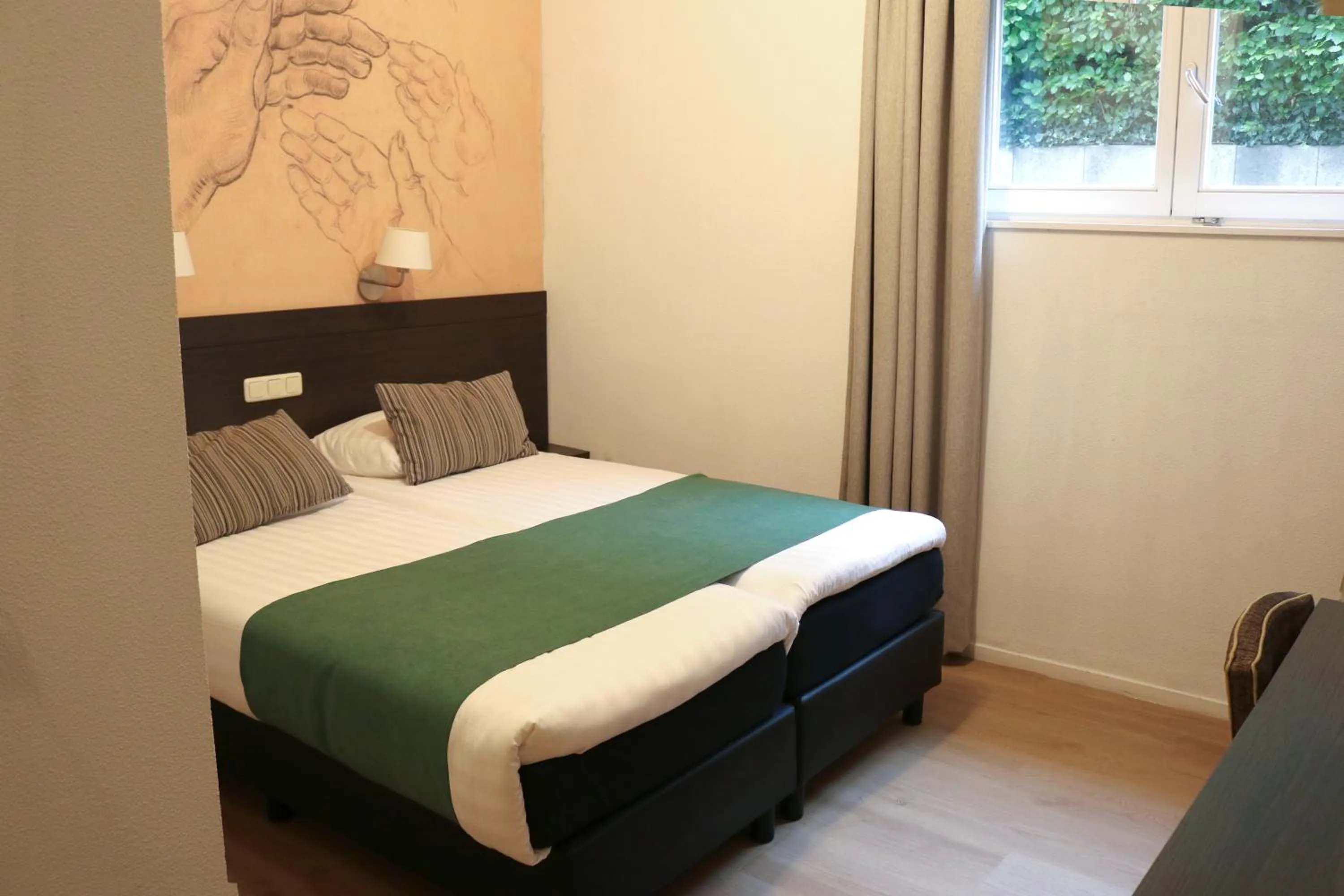 Bed in Parkhotel Auberge Vincent