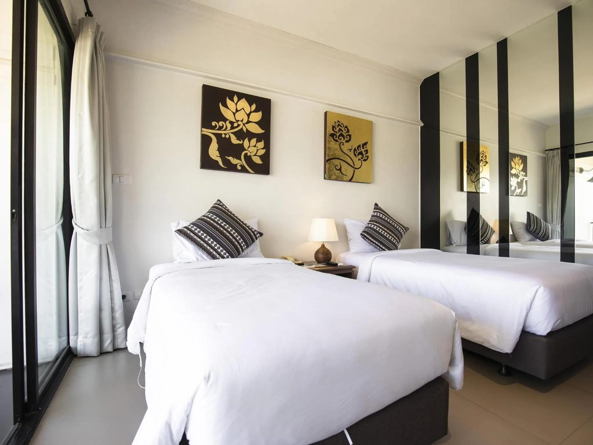 Photo of the whole room, Bed in Fortune Riverview Hotel Chiang Khong