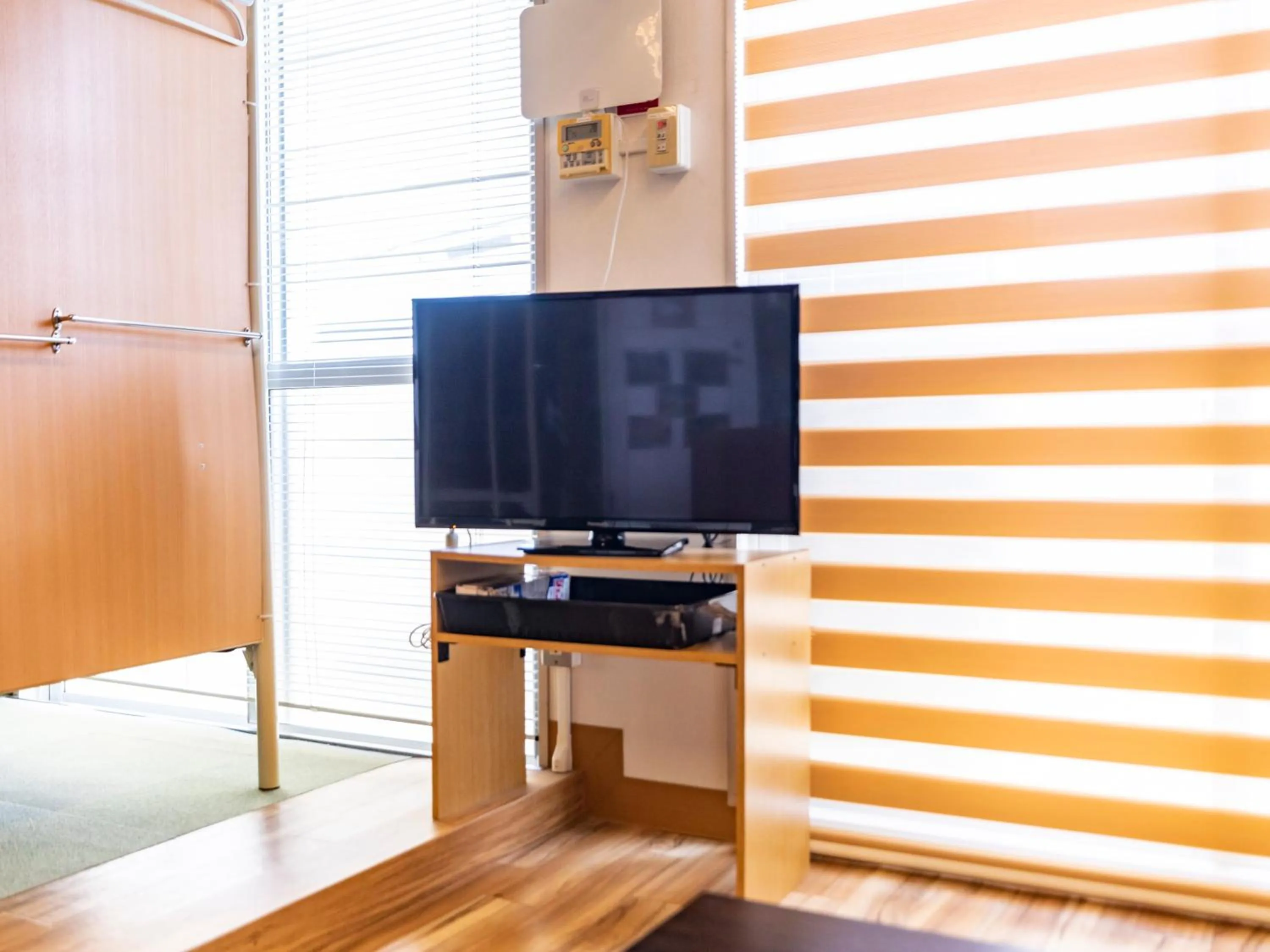 TV and multimedia in Omotenashi Hostel Miyajima