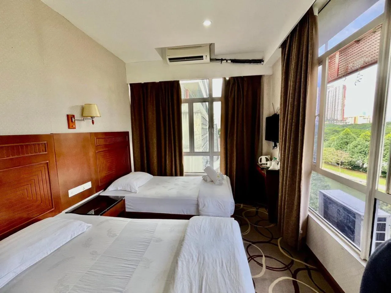 Bed in Fan Holiday Hotel