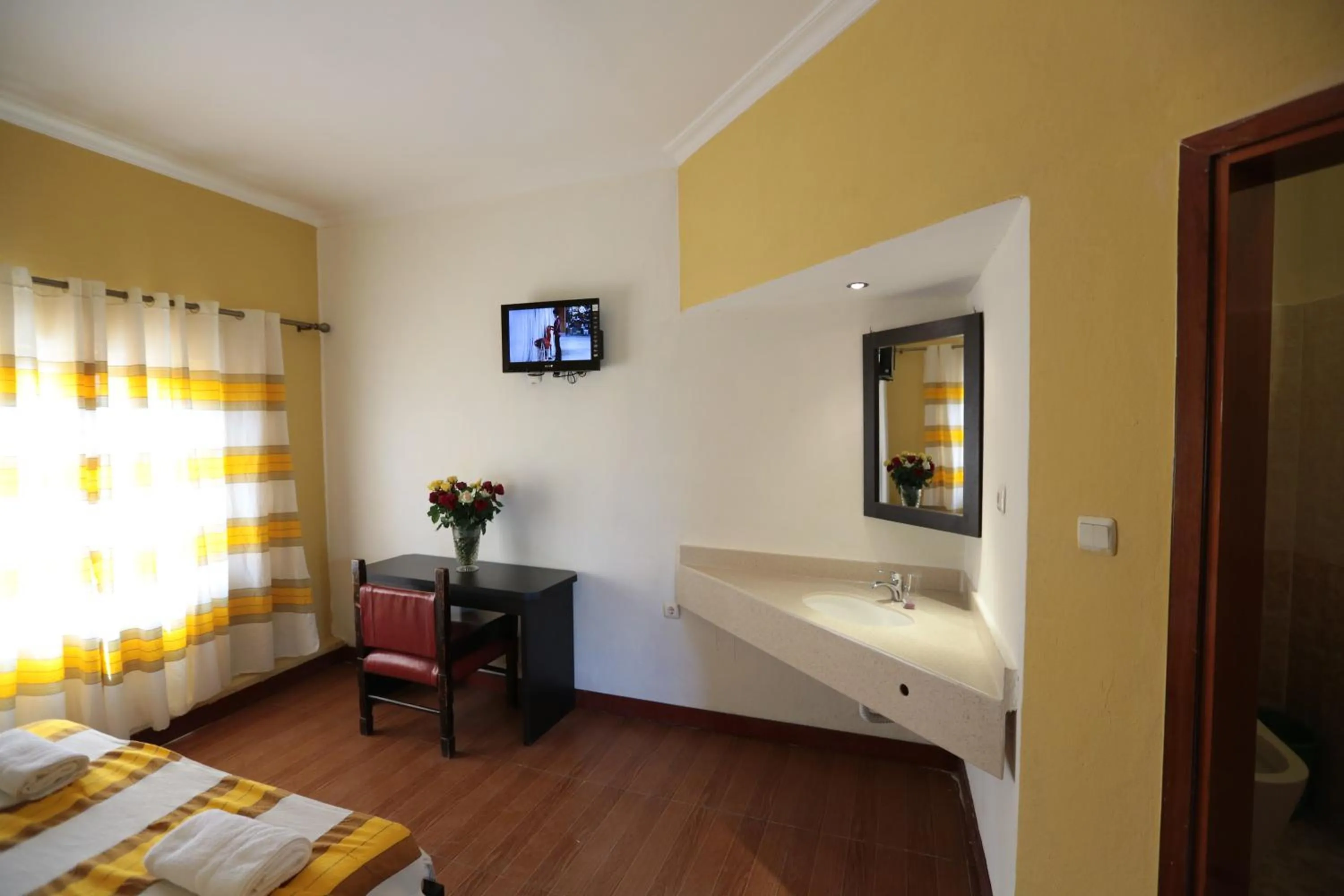 TV and multimedia, Bed in Goha Hotel