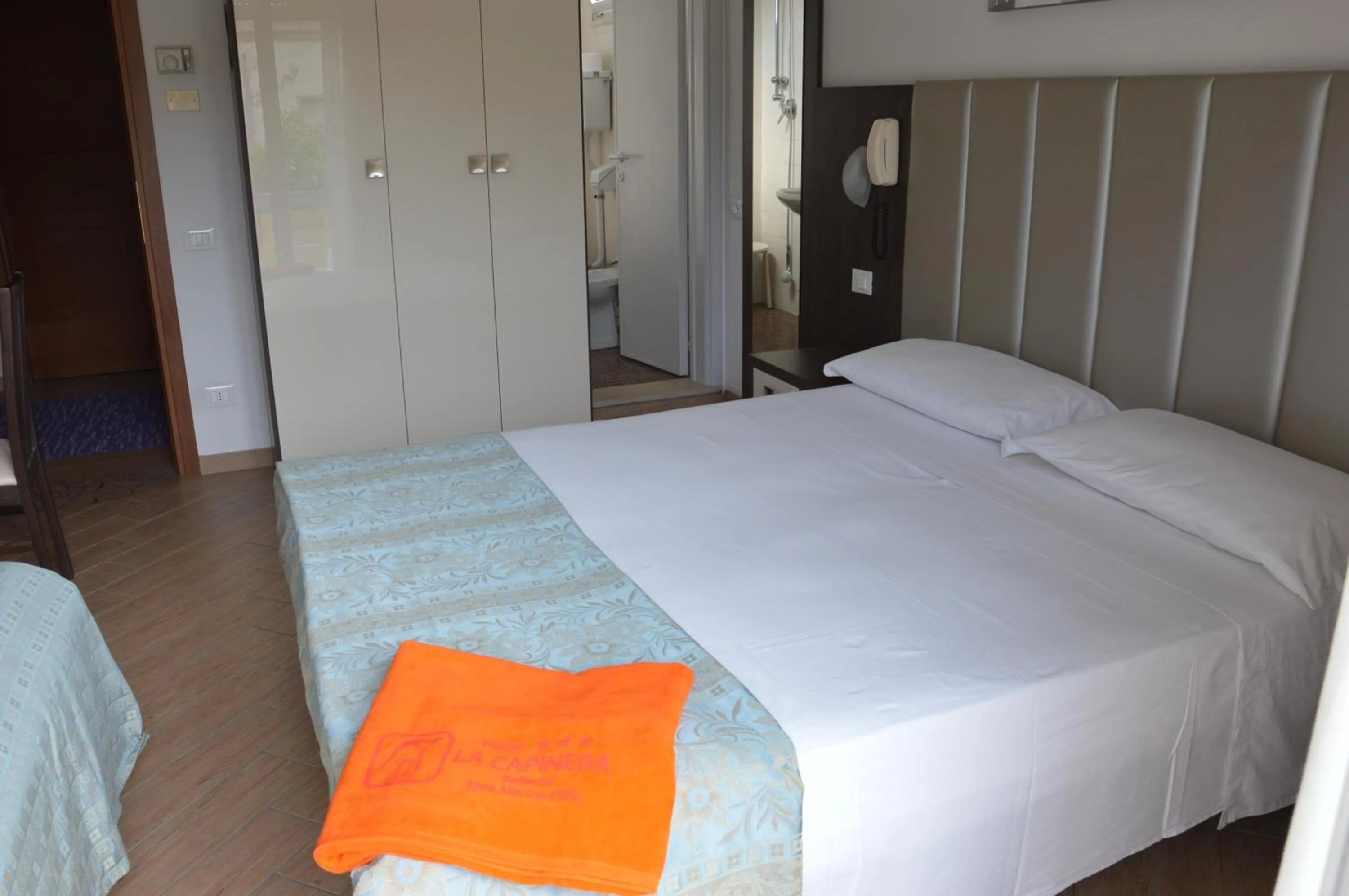 Bedroom in Hotel La Capinera