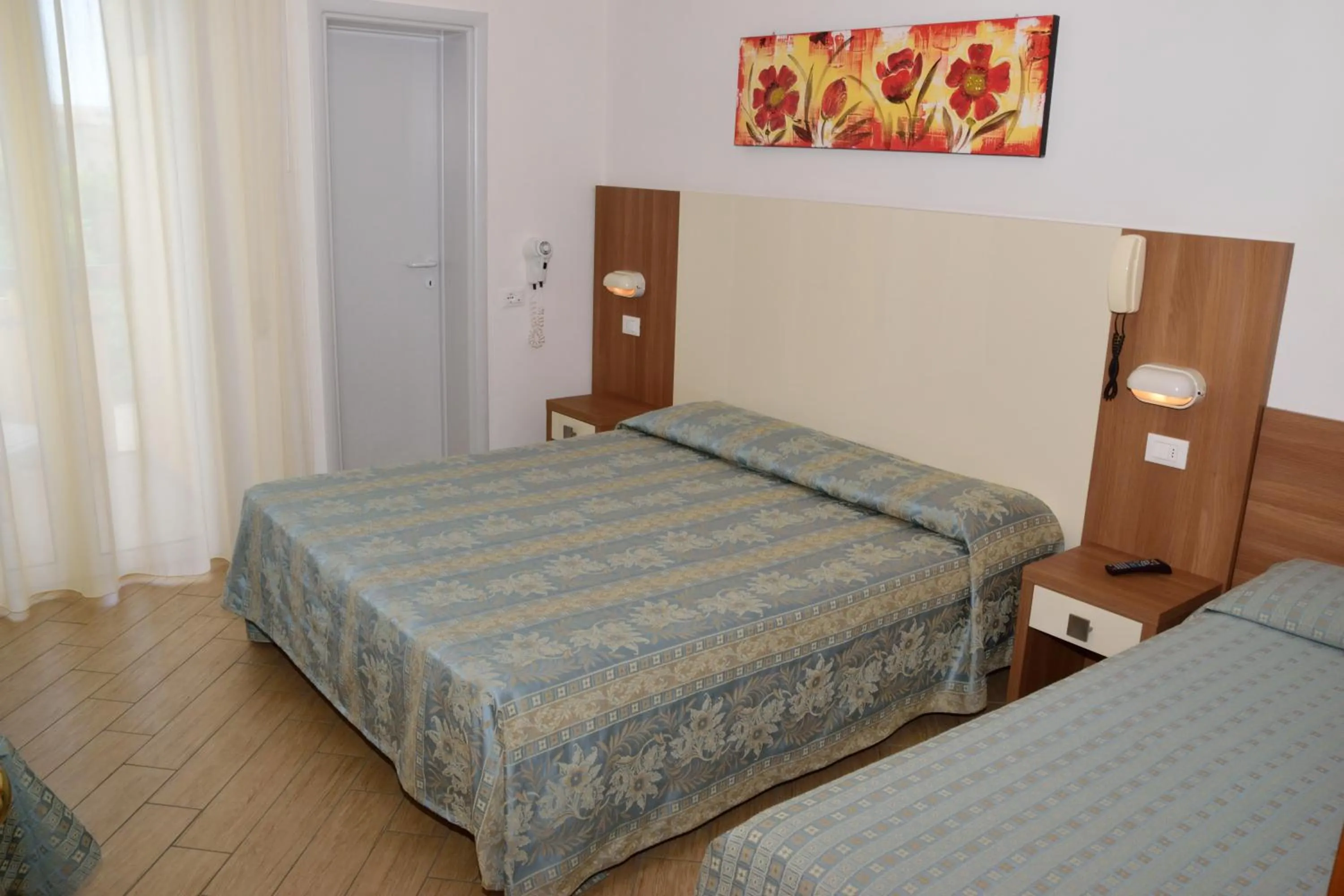 Bedroom in Hotel La Capinera