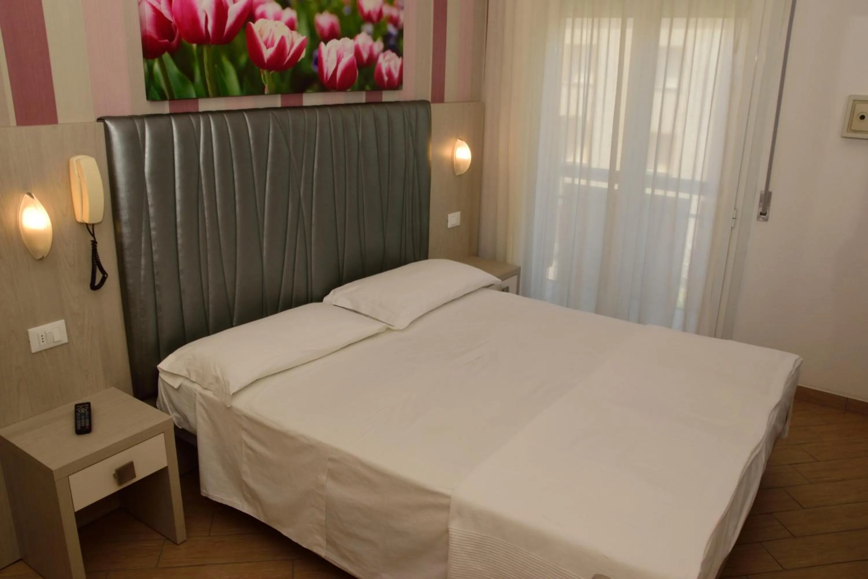 Bedroom in Hotel La Capinera