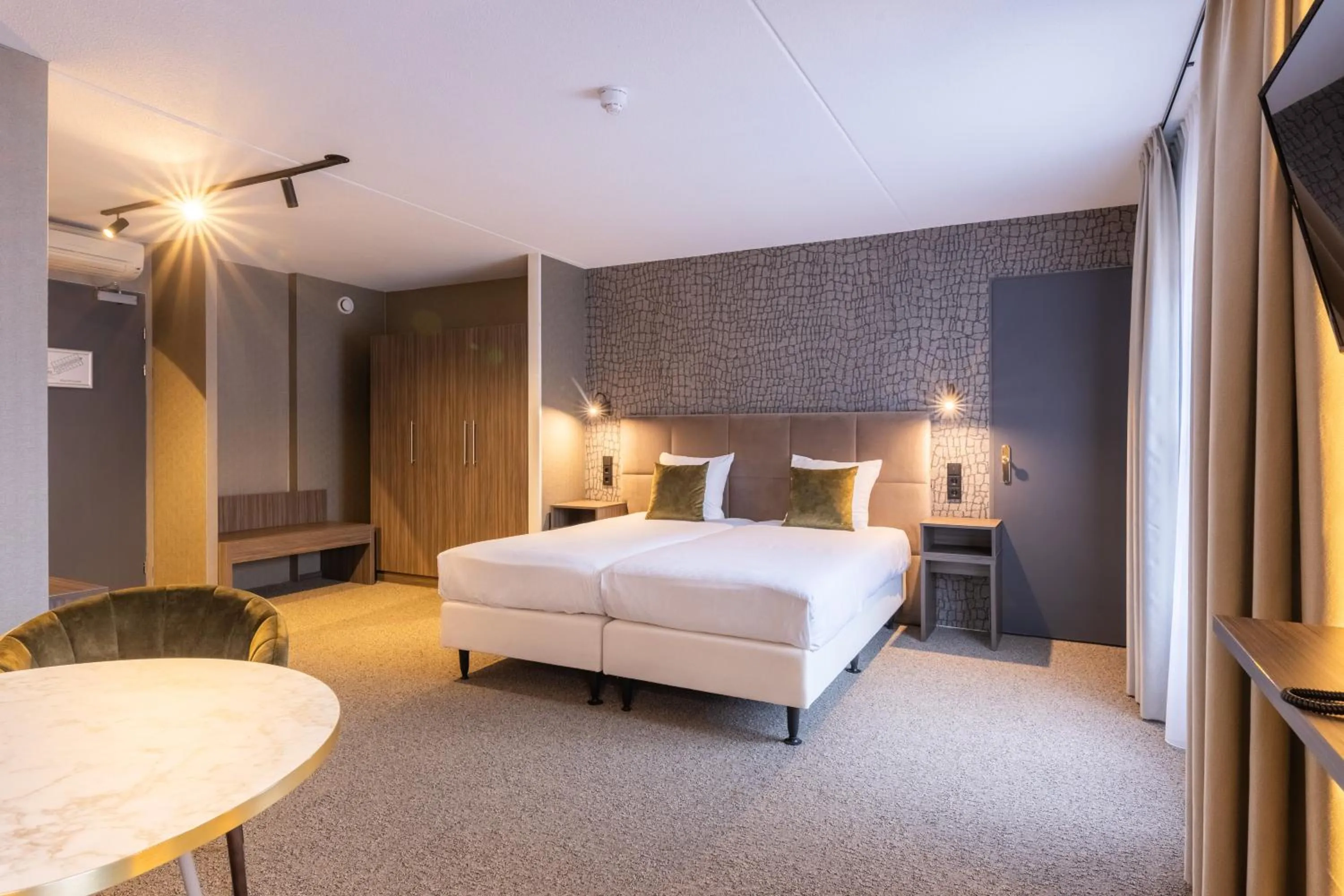 Bed in Hotel Asteria