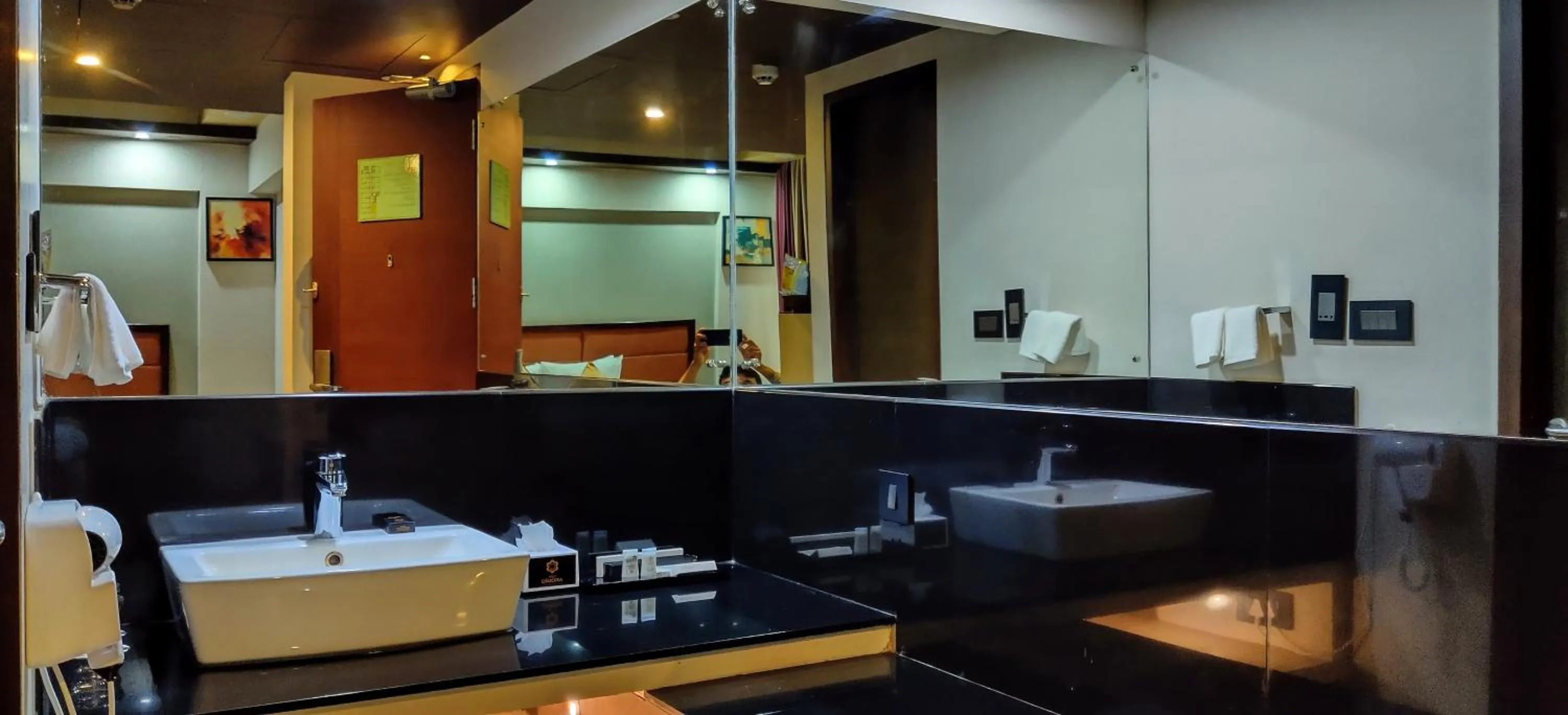 Bathroom in Dimora Hotel Thiruvananthapuram