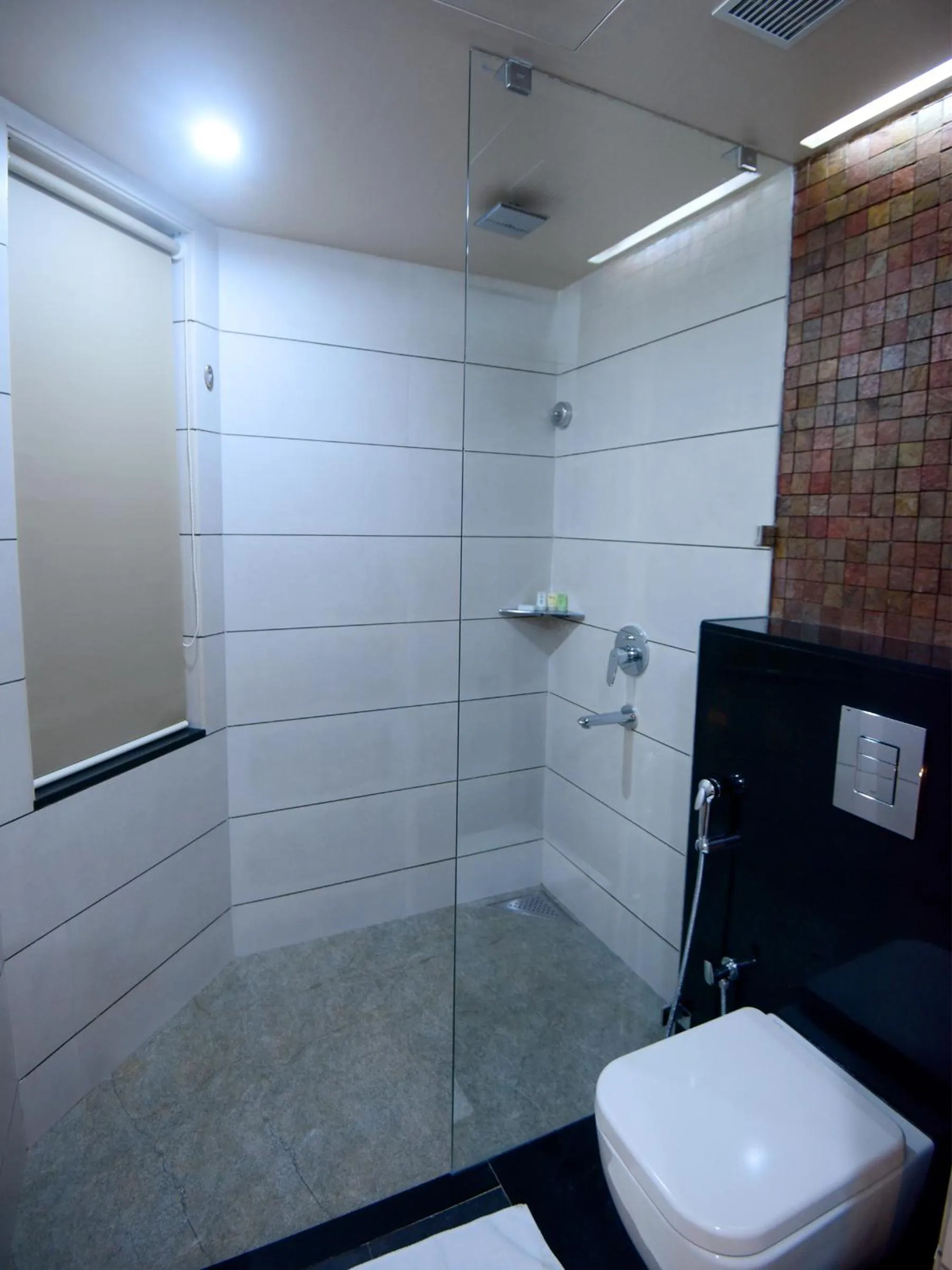 Bathroom in Dimora Hotel Thiruvananthapuram