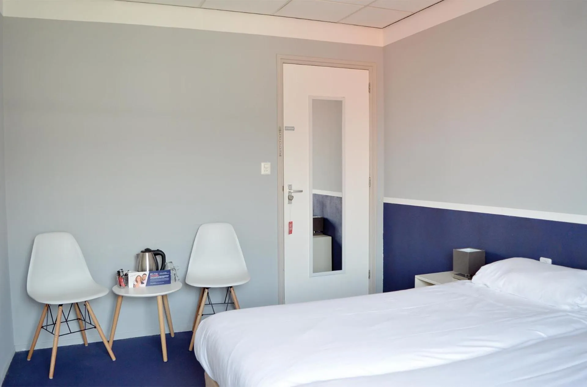 Photo of the whole room, Bed in Belgische Loodsensociëteit