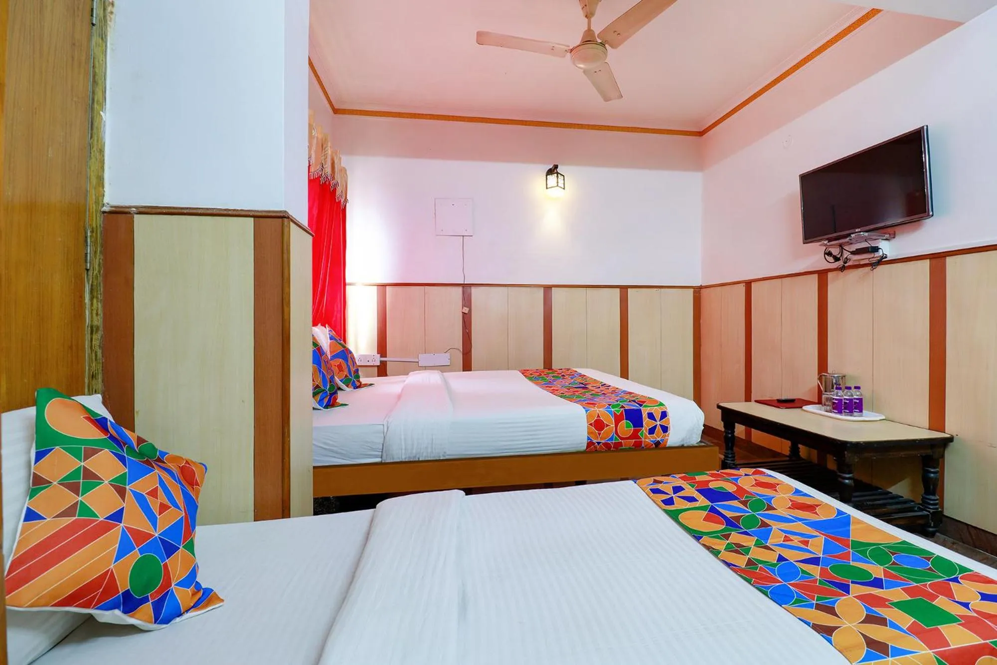 Photo of the whole room in FabHotel Shivaals Residency - Rajajinagar