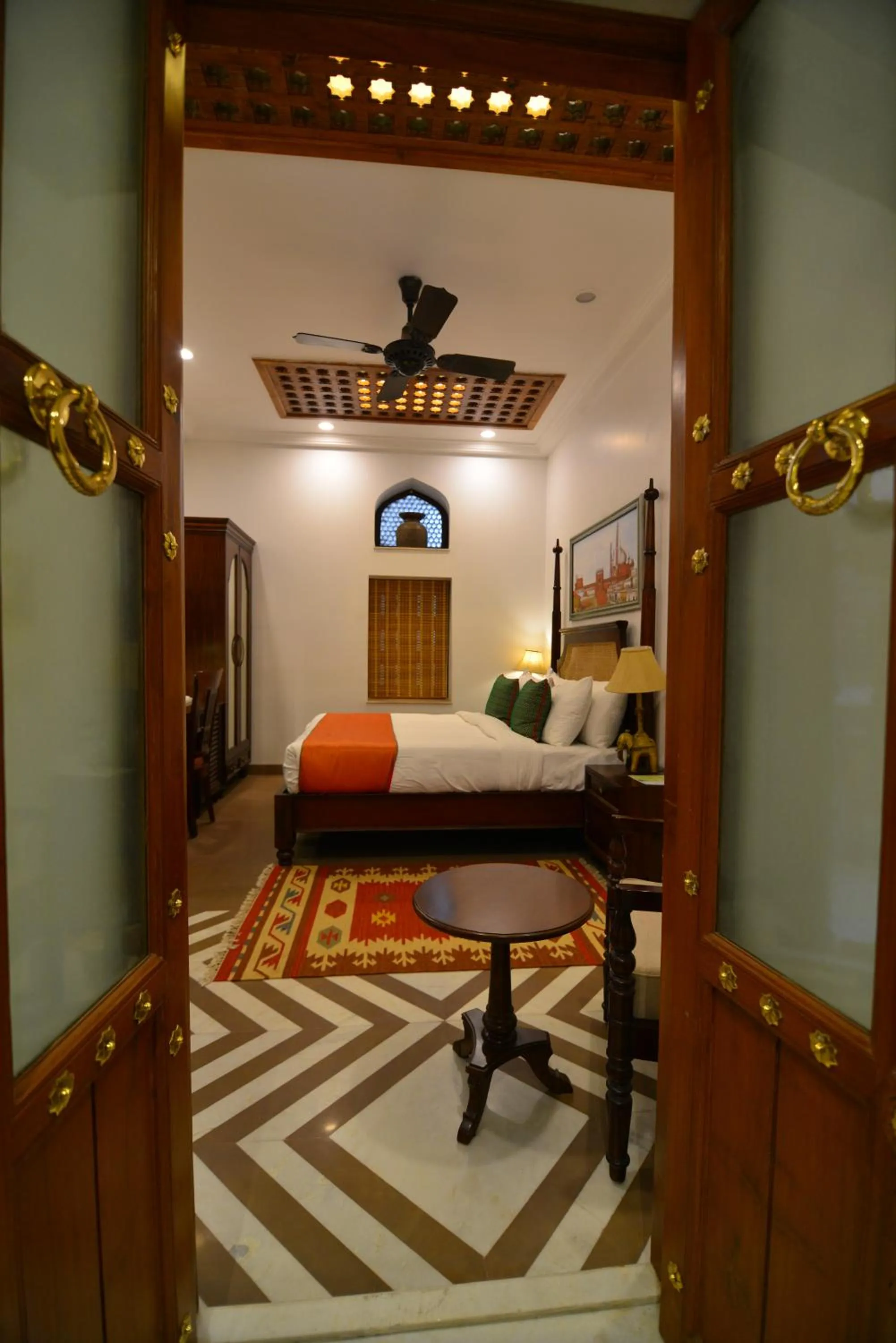 Photo of the whole room in Haveli Dharampura & Golden Haveli- UNESCO awarded Boutique Heritage Hotel