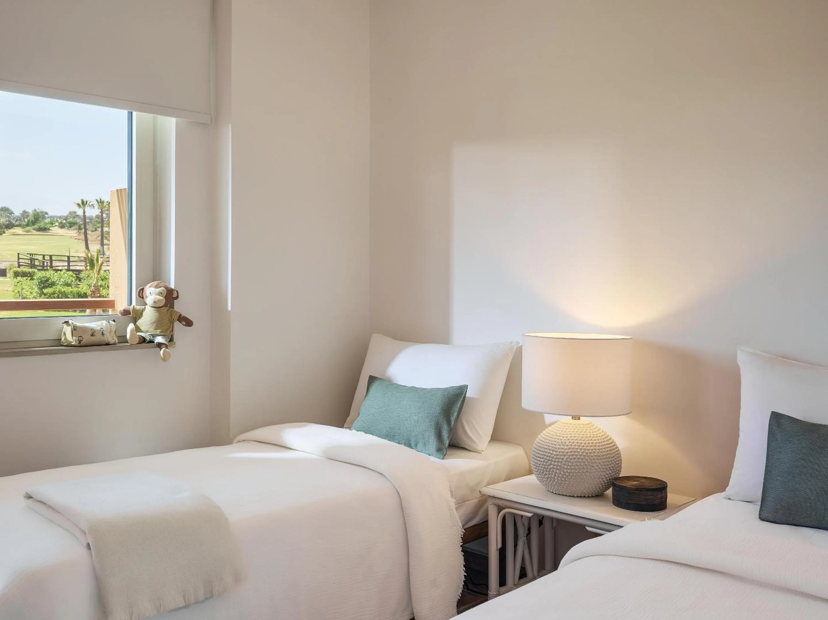 Bed in Grecotel Marine Palace & Aqua Park