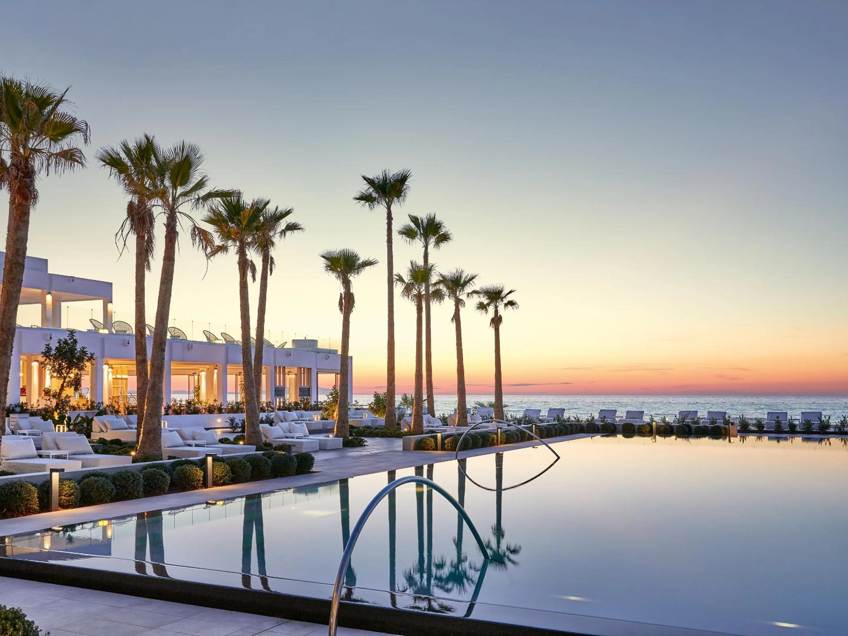 Swimming pool in Grecotel LUXME White