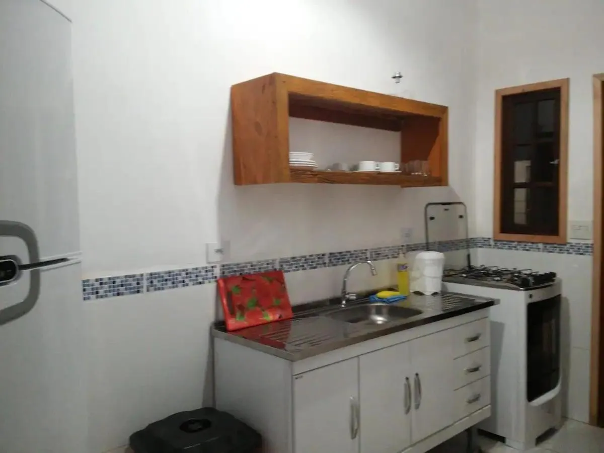 Kitchen or kitchenette in Chalés Azuleto - Ilhabela