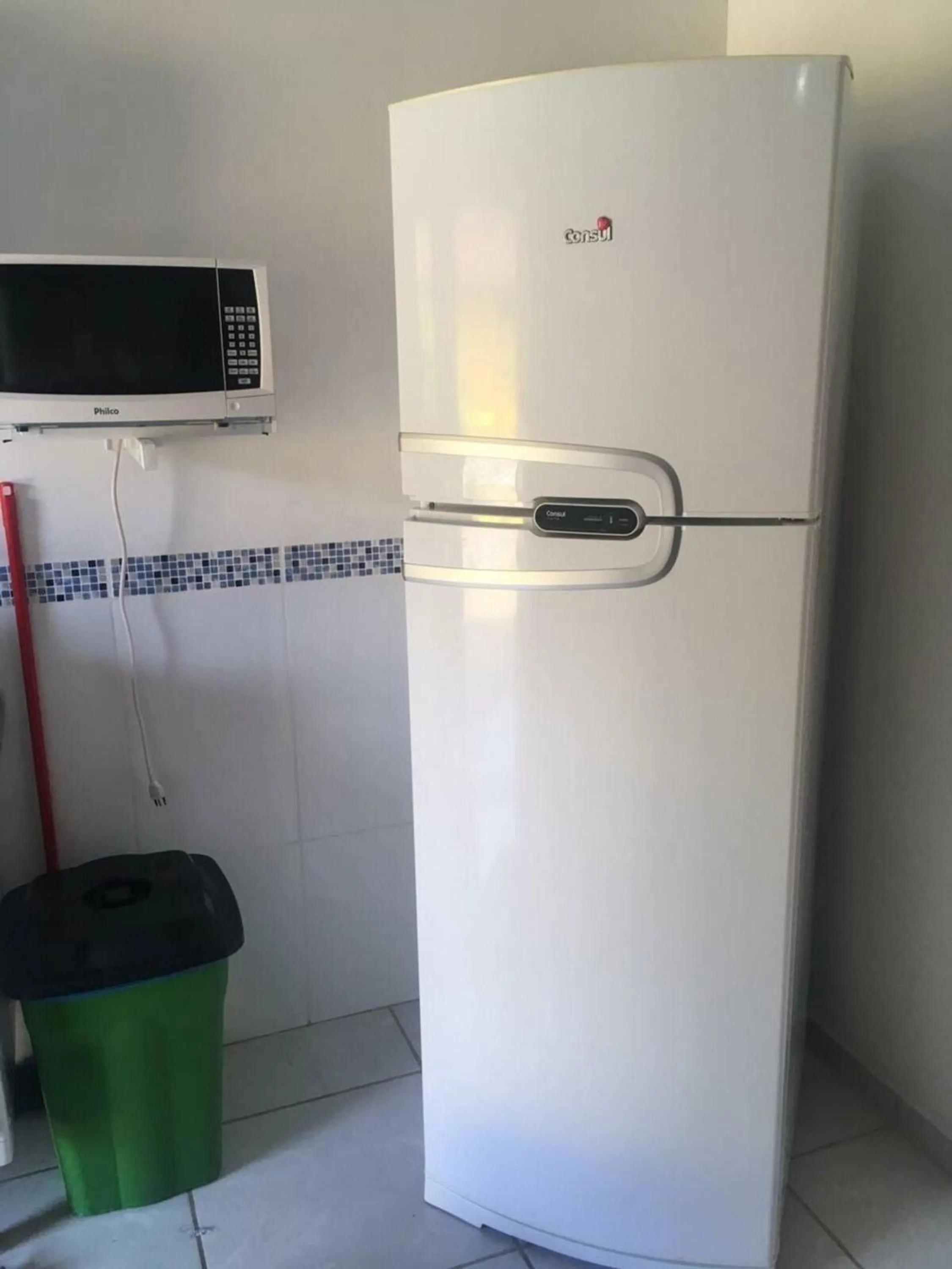 Kitchen or kitchenette in Chalés Azuleto - Ilhabela