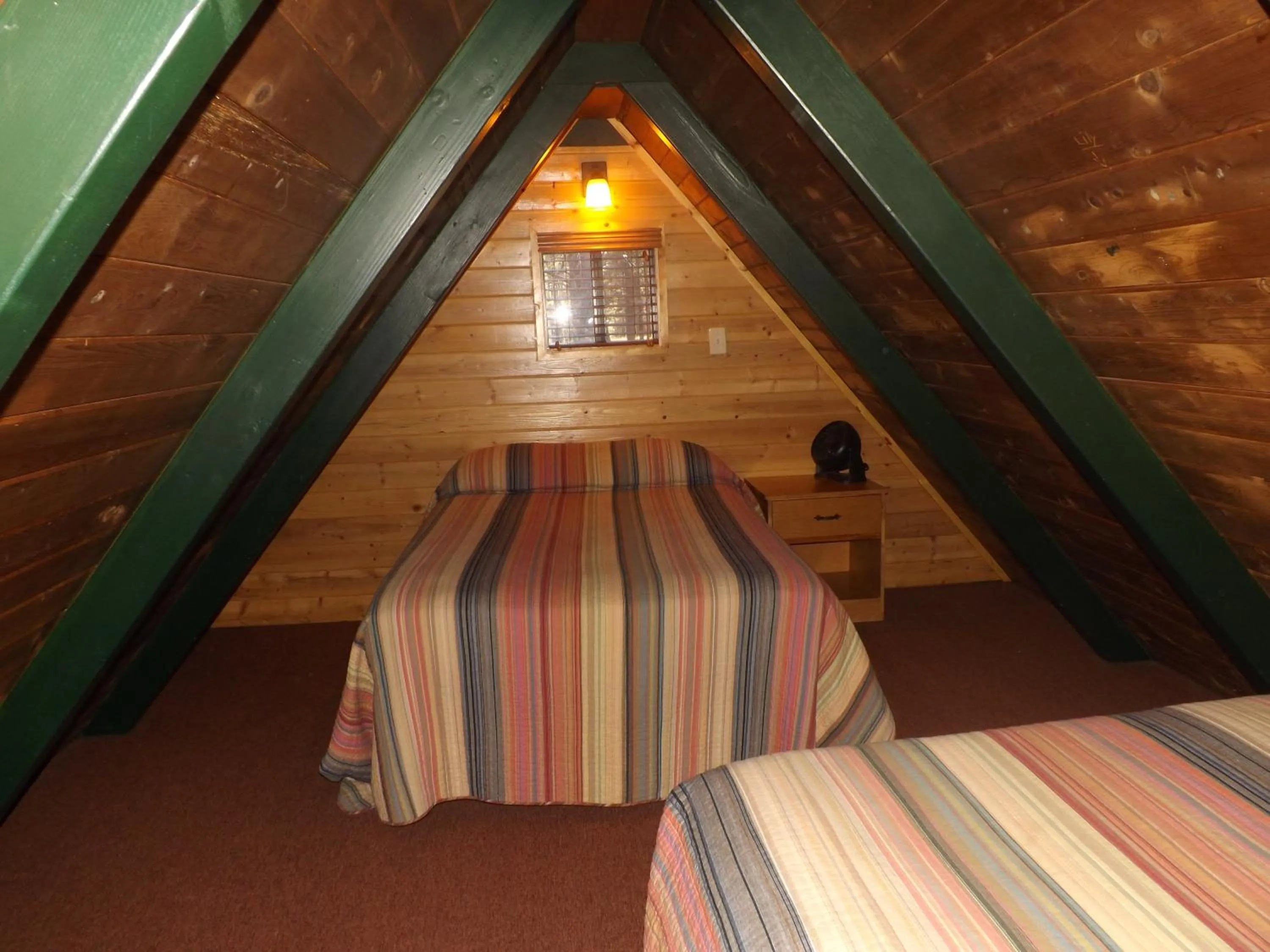 Bed in Arizona Mountain Inn & Cabins