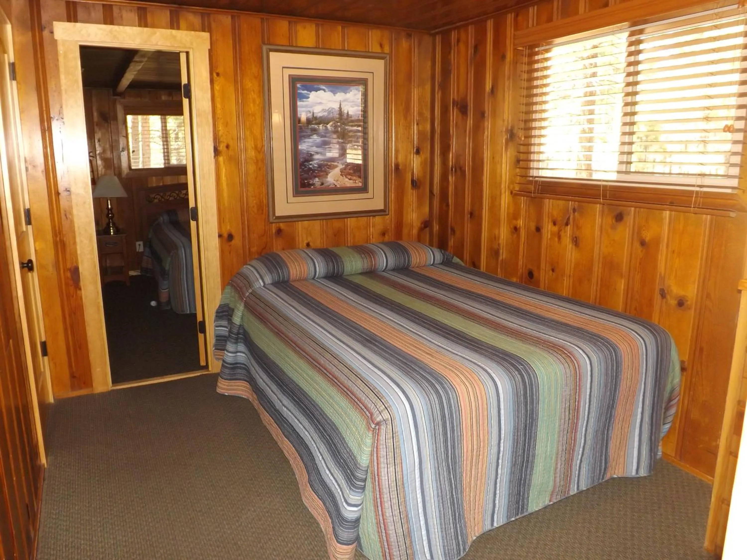 Bed in Arizona Mountain Inn & Cabins