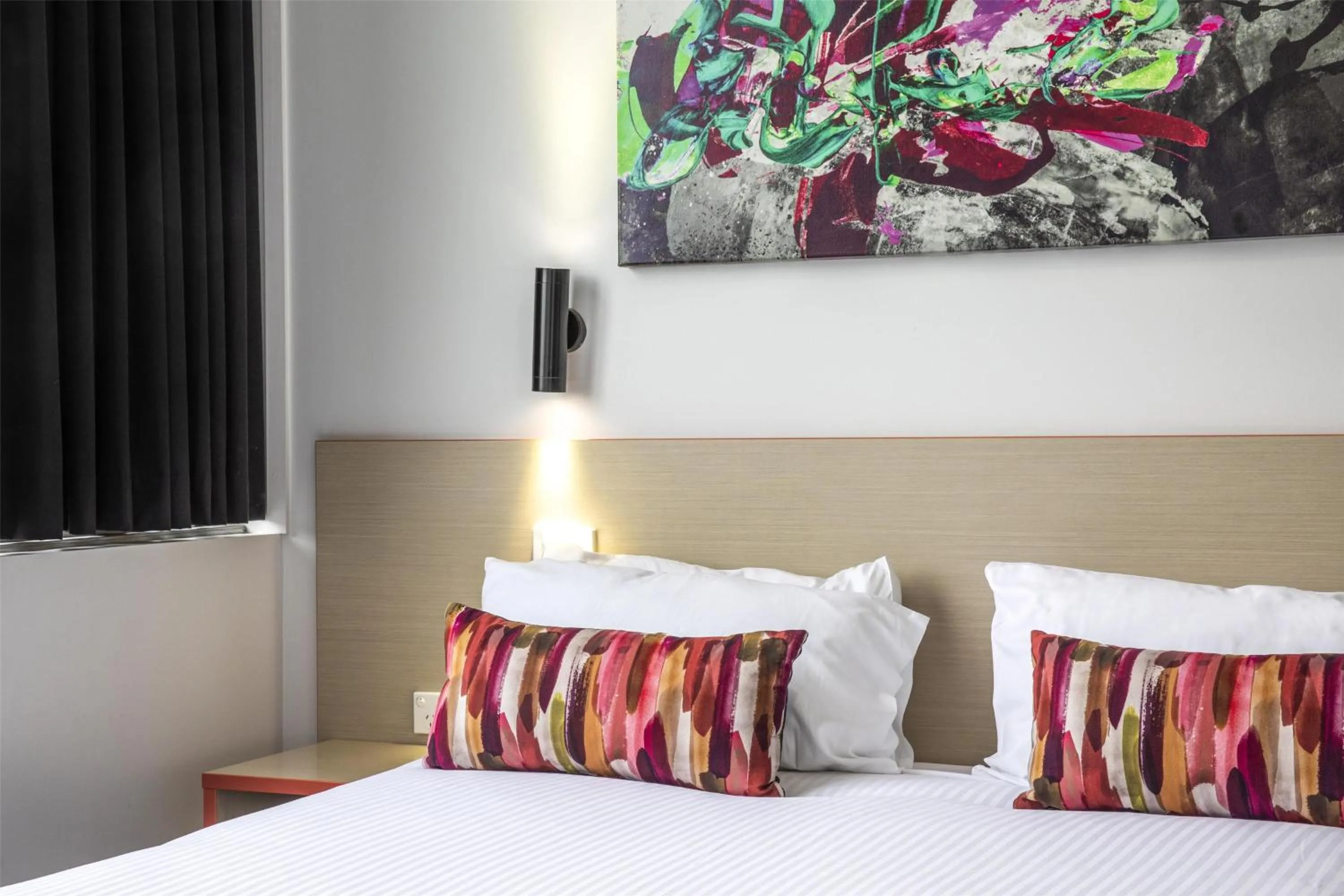 Bedroom, Bed in Nightcap at Ashley Hotel