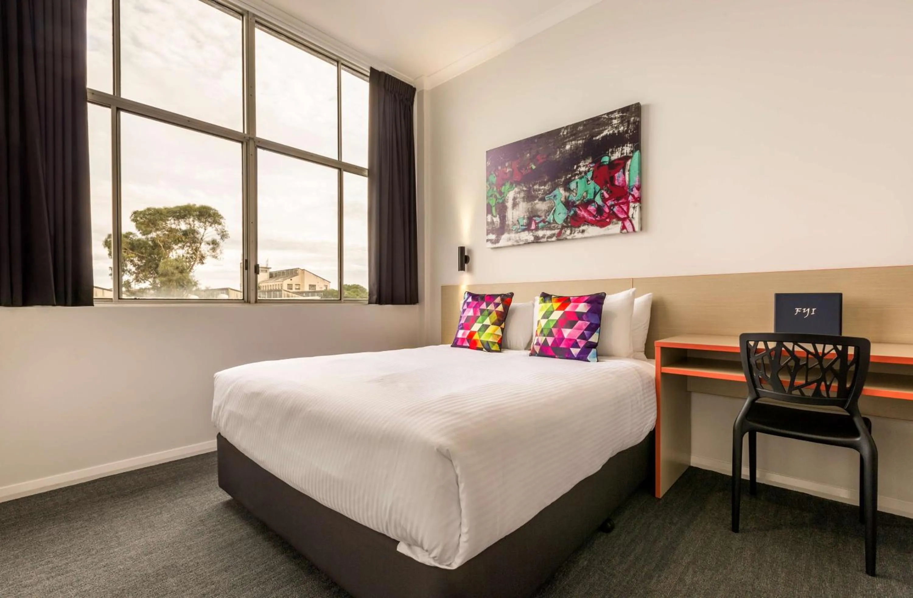 Bedroom, Bed in Nightcap at Ashley Hotel