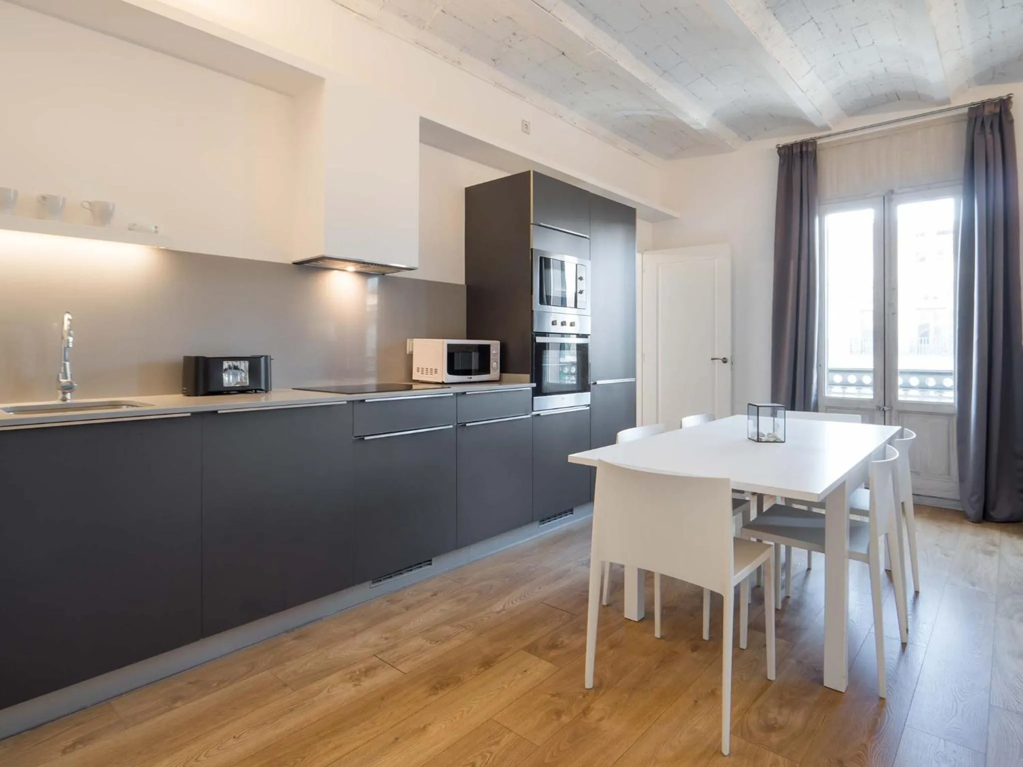 Kitchen or kitchenette in Rent Top Apartments Rambla Catalunya