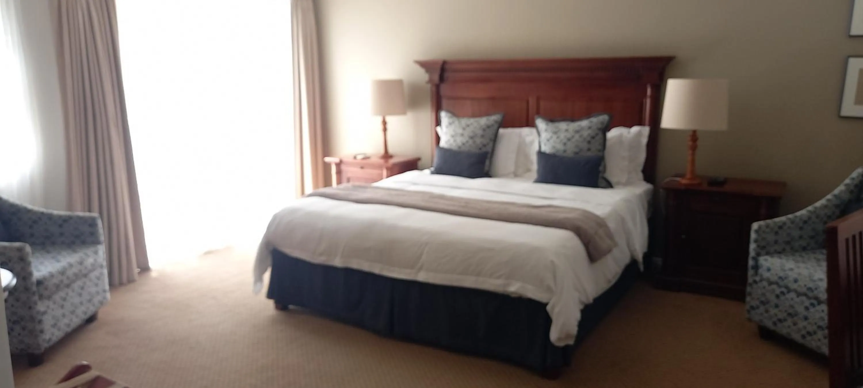 Bed in Cinnamon Boutique Guest House