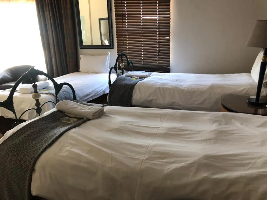 Bed in Africa Footprints Lodge Kempton Park