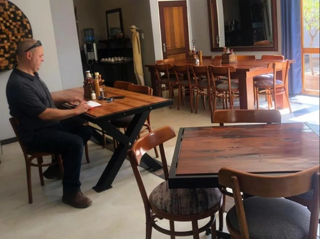 Dining area in Africa Footprints Lodge Kempton Park