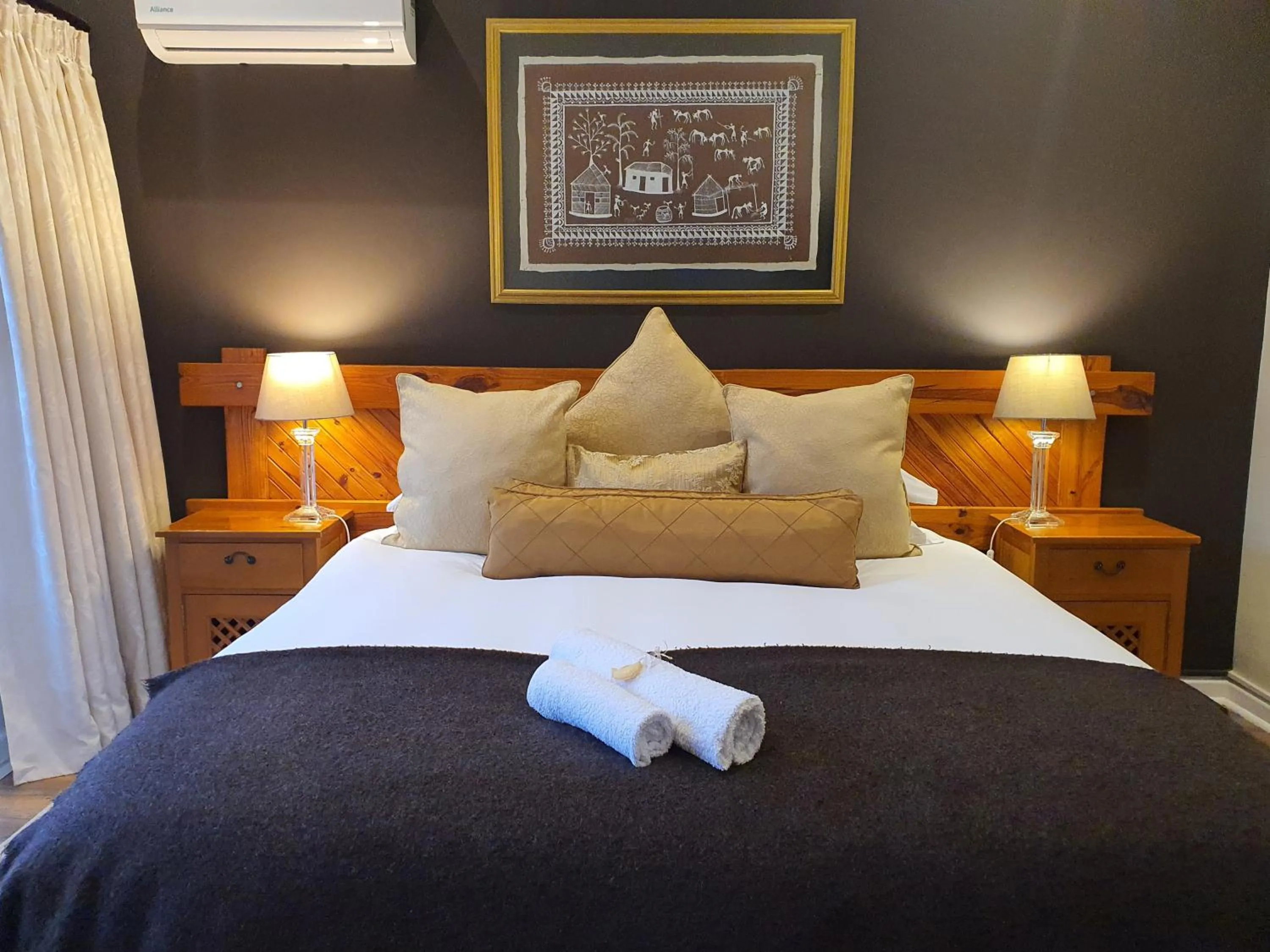 Bed in Wild Olive Guest House & Villa