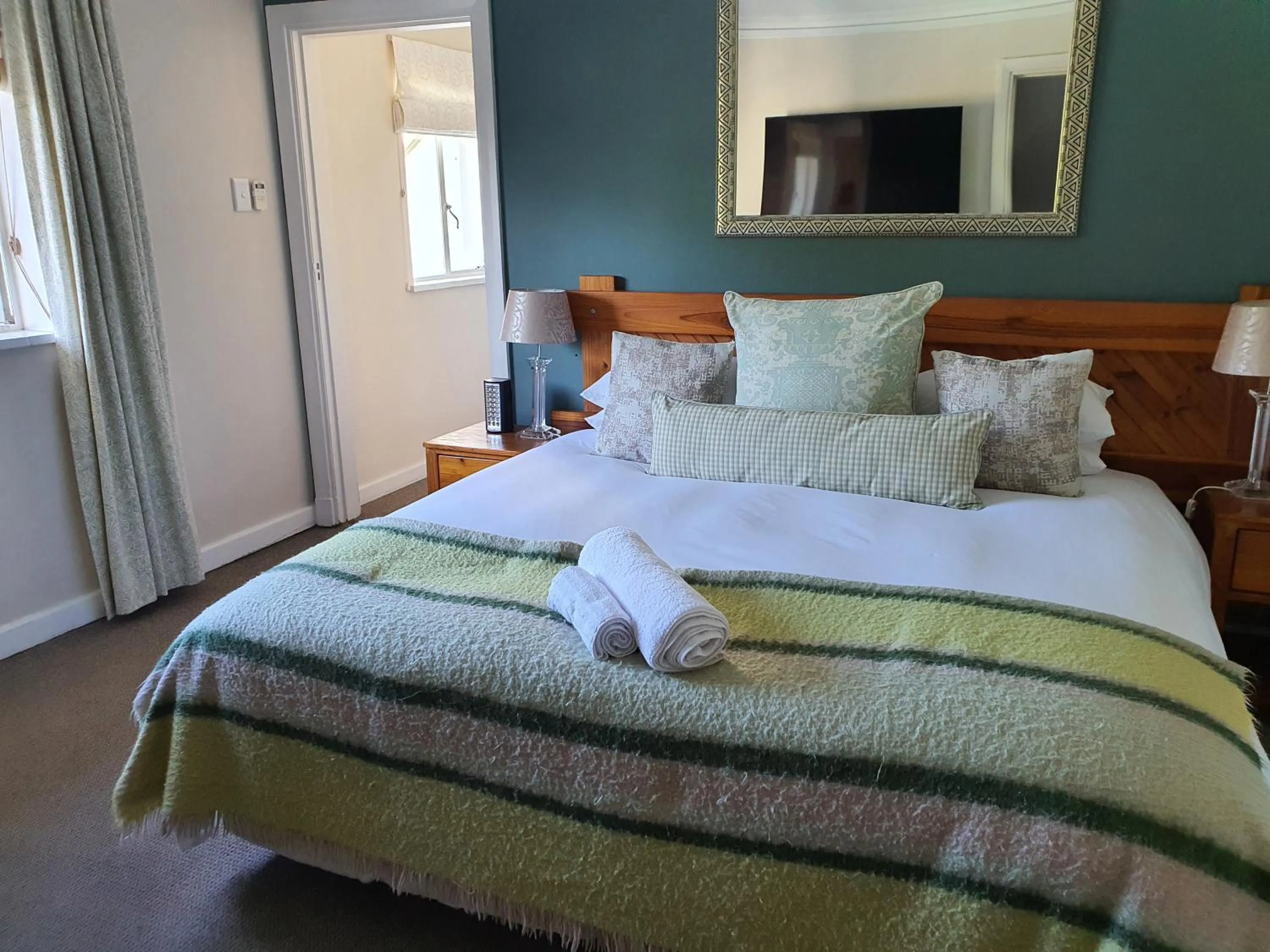 Bed in Wild Olive Guest House & Villa