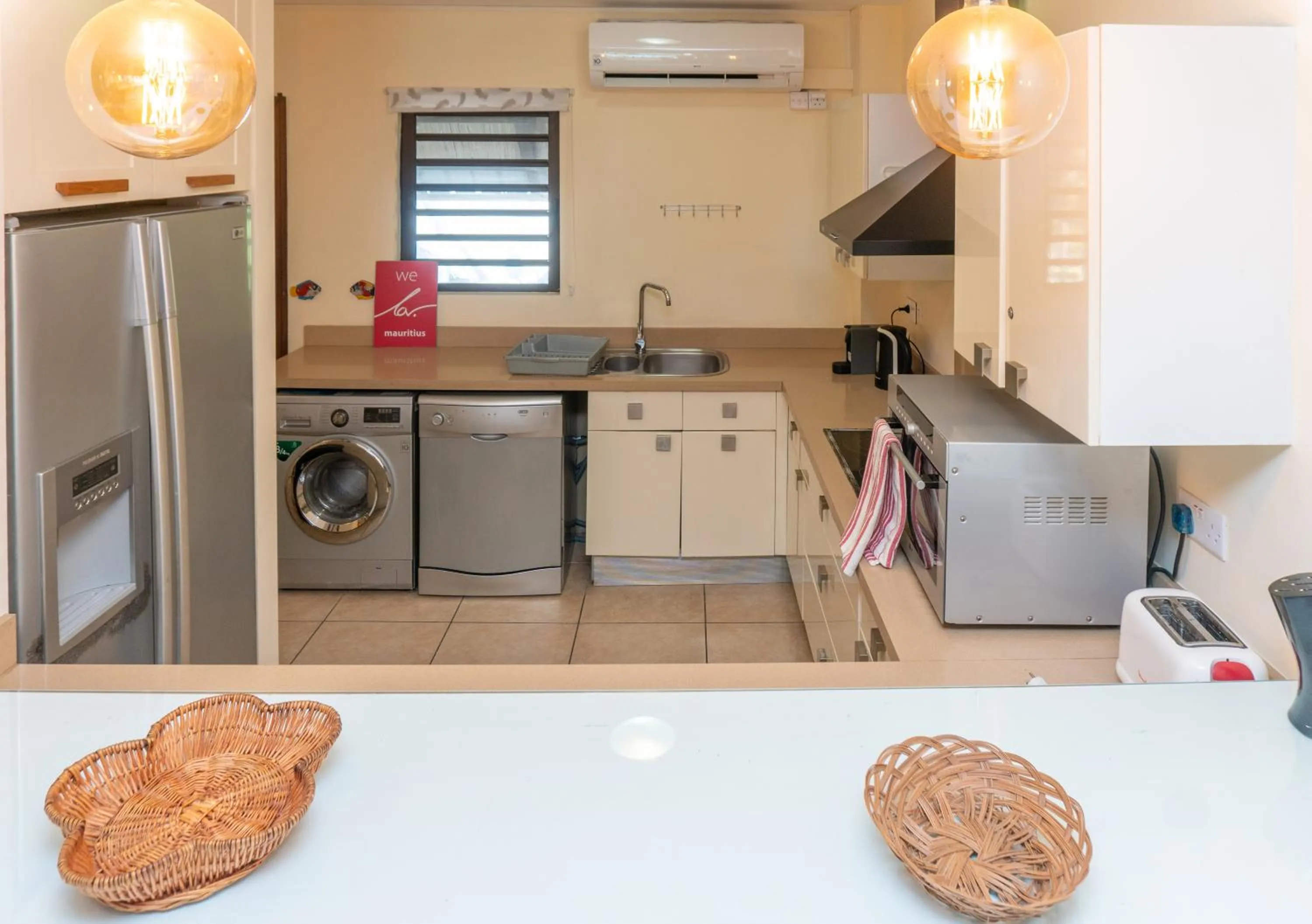 Kitchen or kitchenette in Bel Azur Beach Residence by LOV Mauritius