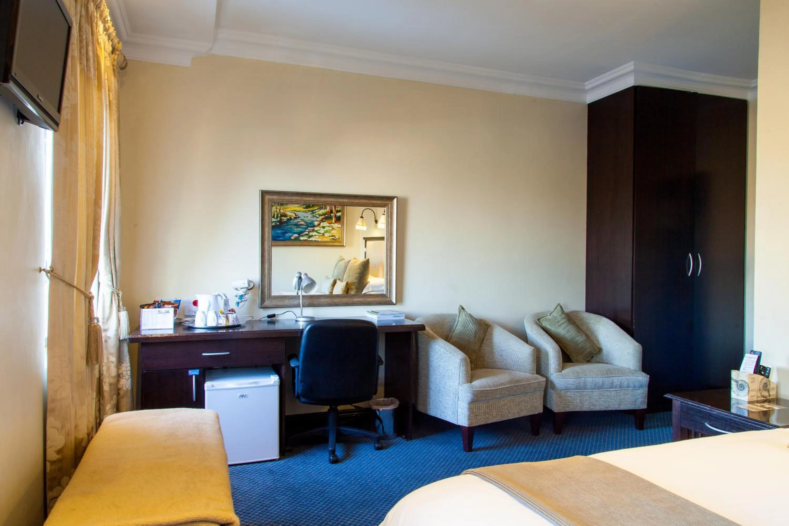 Seating area, Bed in Constantia Manor Guest House
