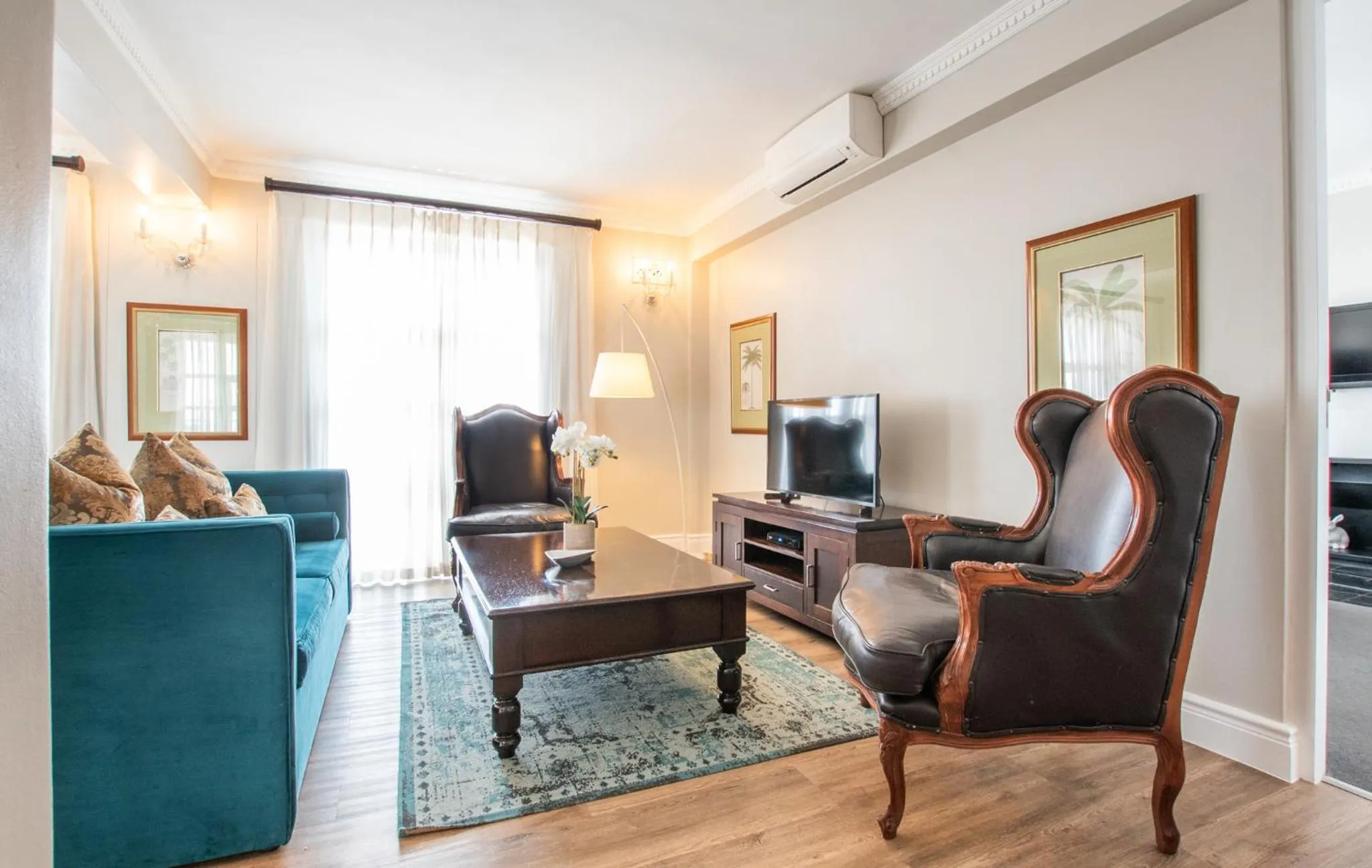 TV and multimedia in Romney Park Luxury Apartments by The Stay Collection