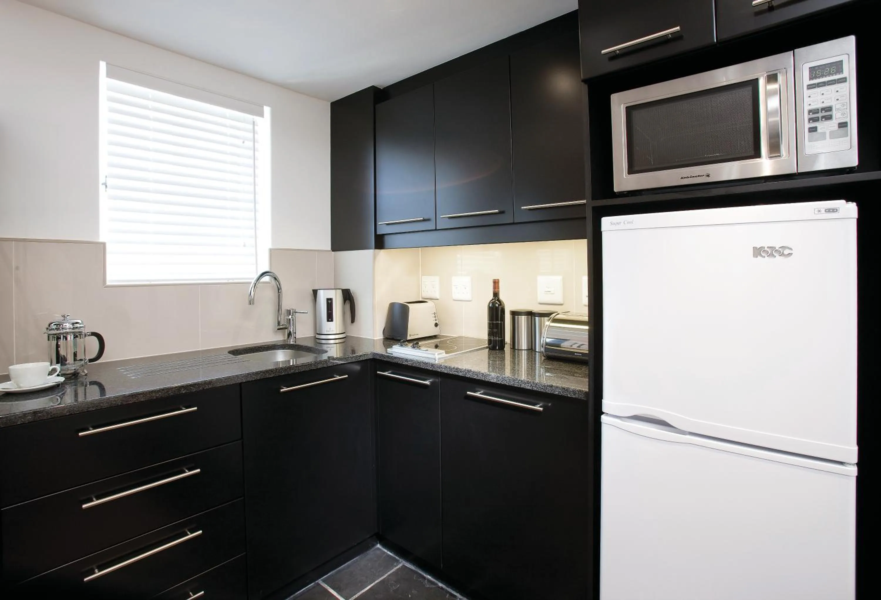 Kitchen or kitchenette in Romney Park Luxury Apartments by The Stay Collection