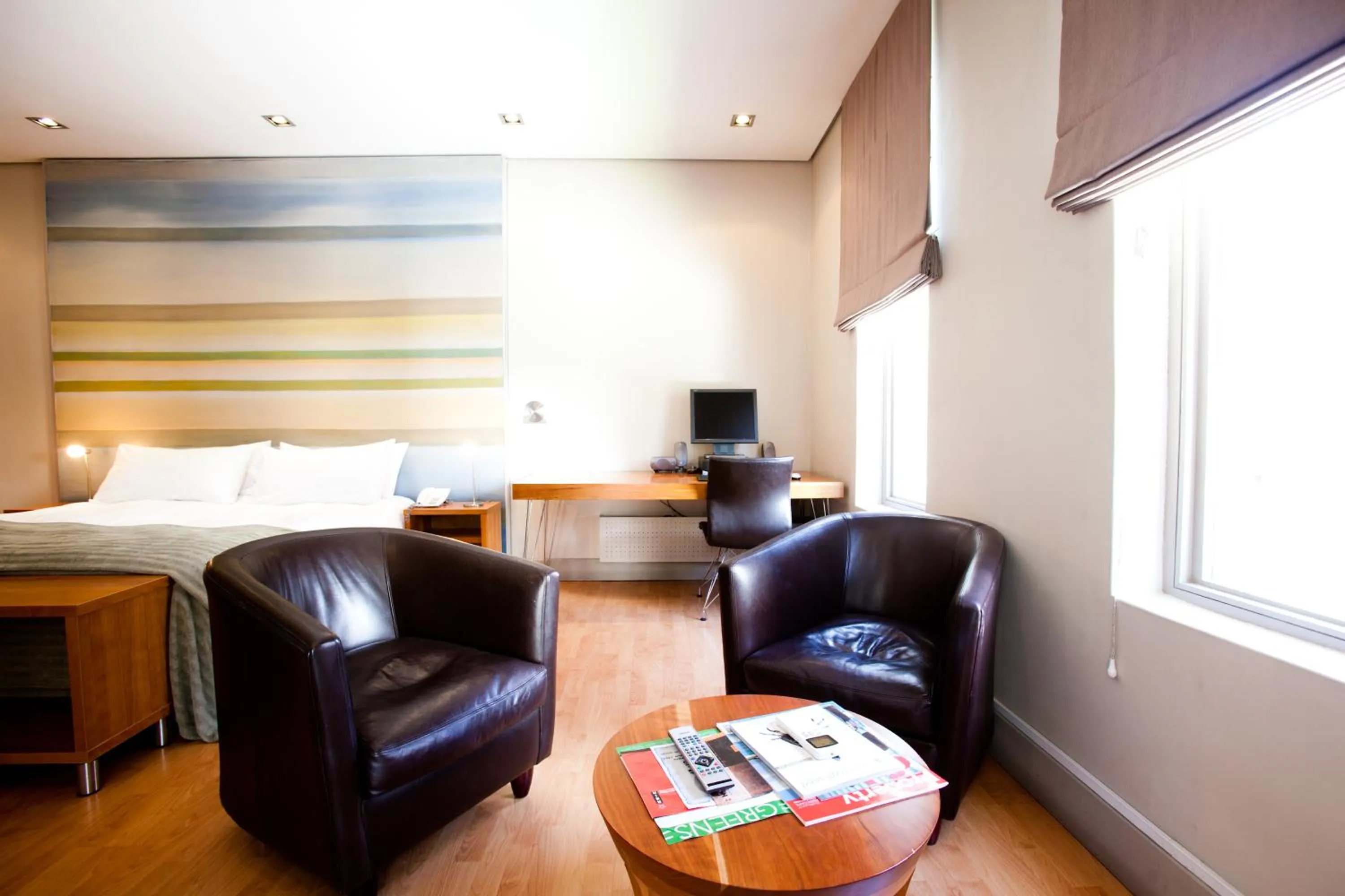 Seating area, Bed in Hippo Boutique Hotel