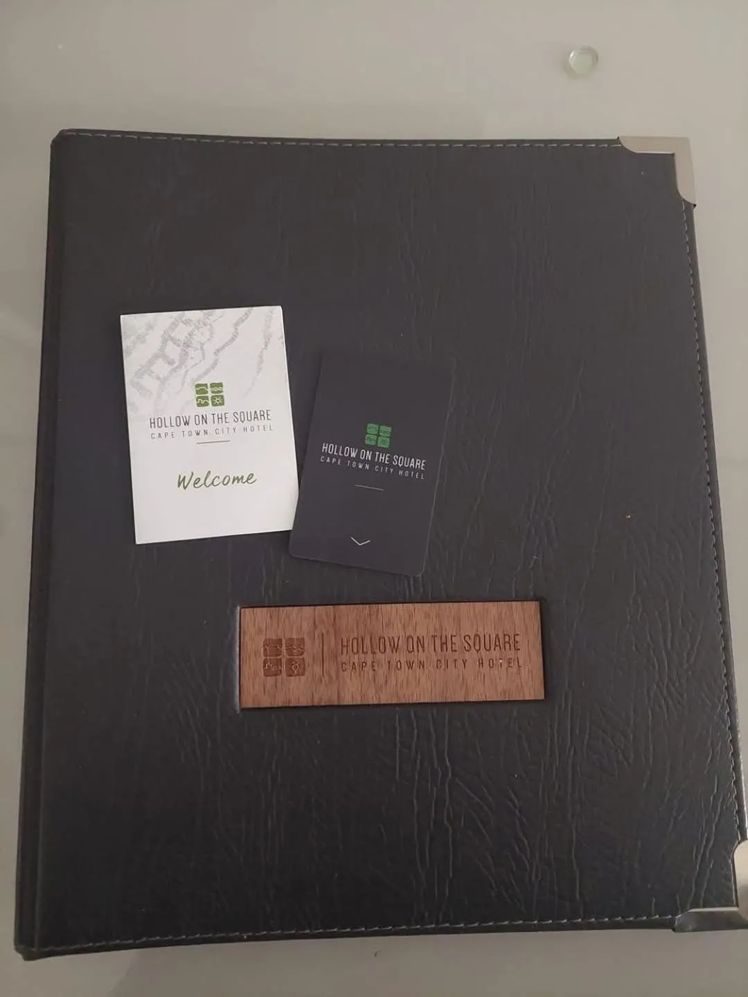 Property logo or sign in Hollow on the Square City Hotel