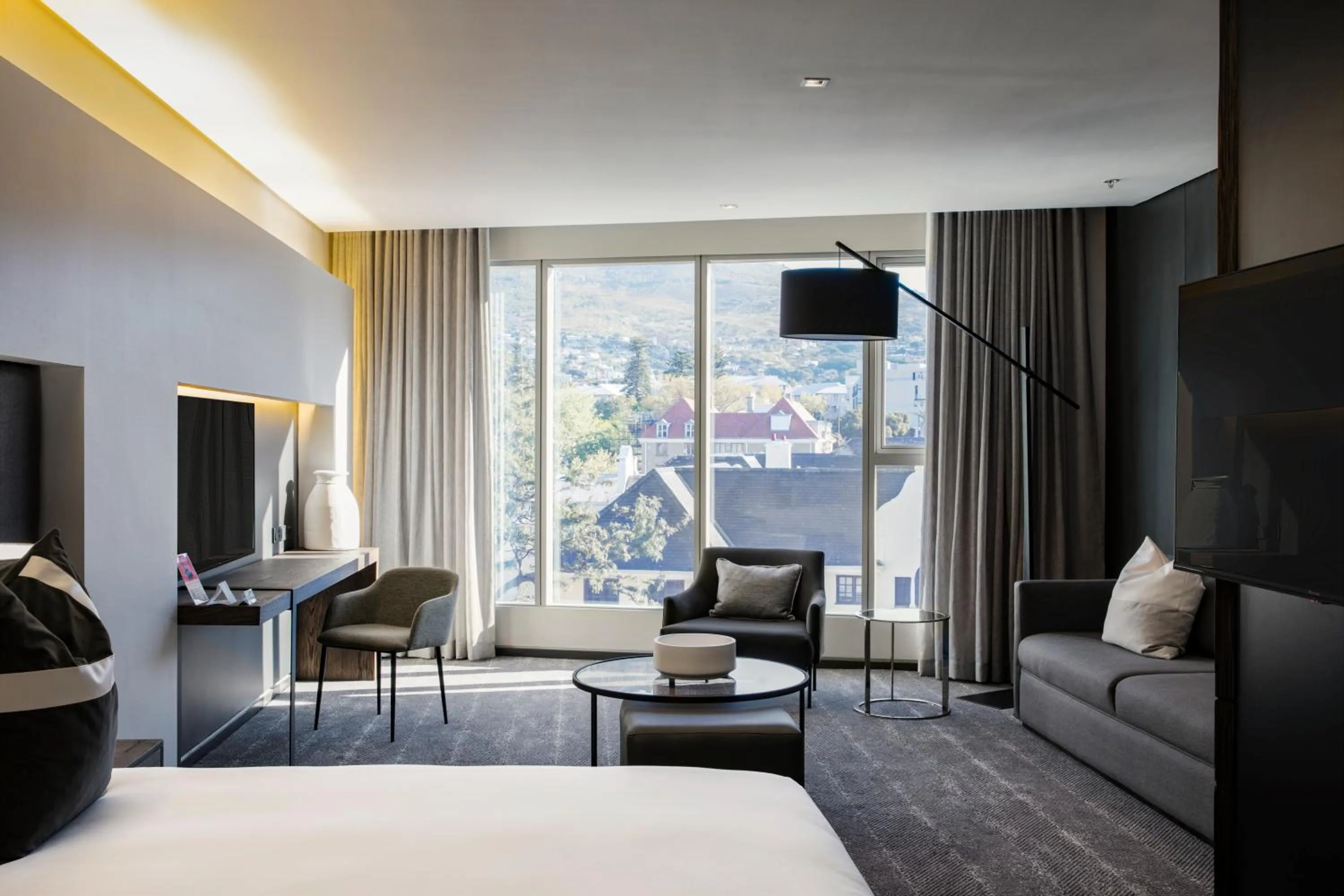 Seating area, Bed in The Capital 15 on Orange Hotel & Spa