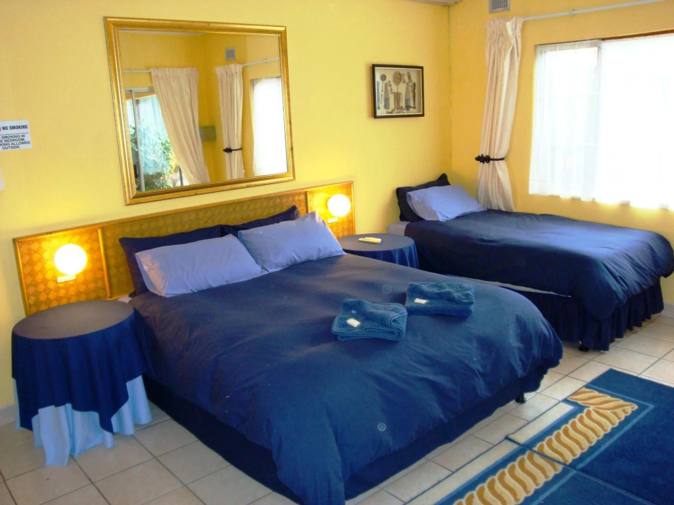 Bed in Flintstones Guest House Durban