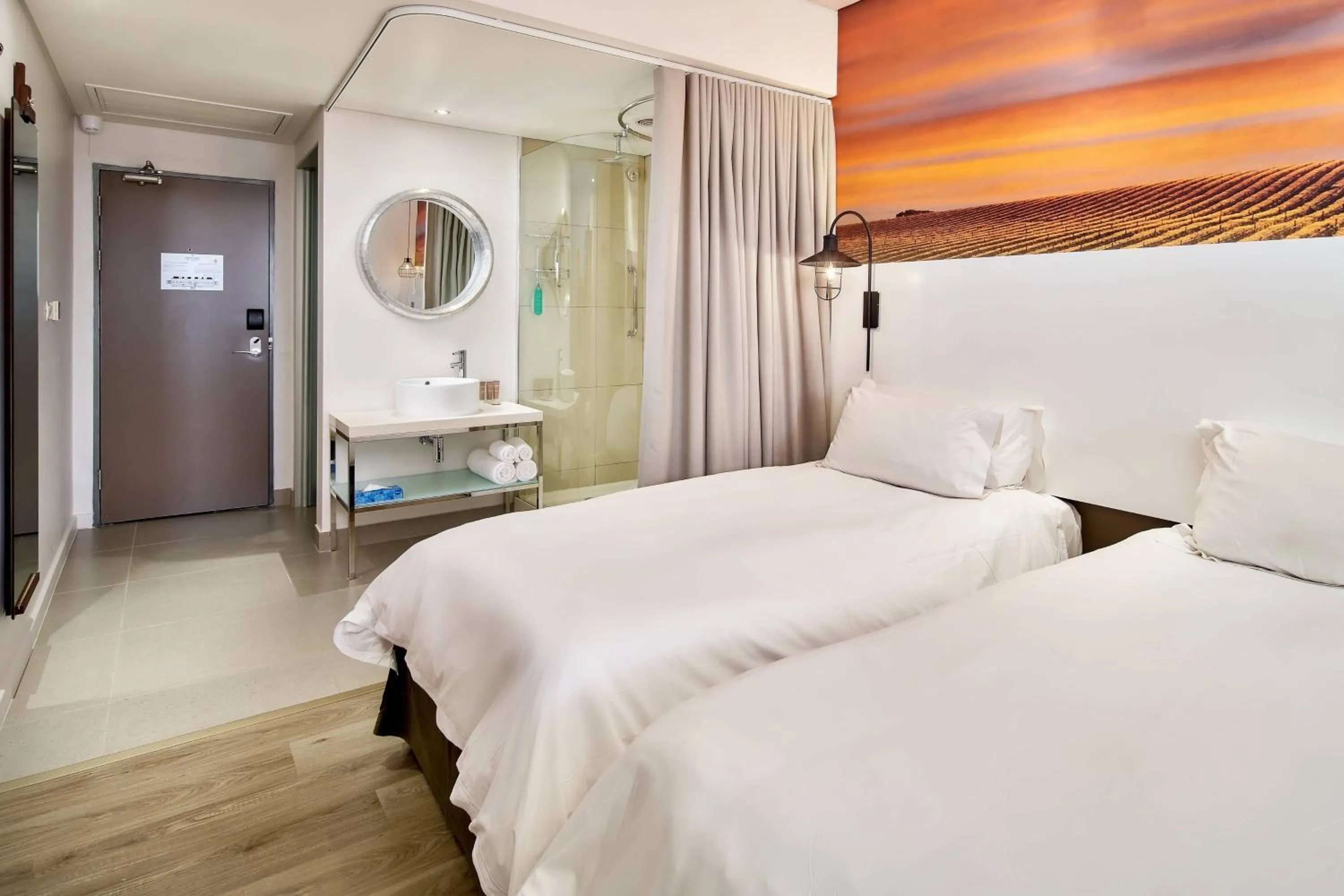 Photo of the whole room, Bed in Protea Hotel by Marriott O R Tambo Airport