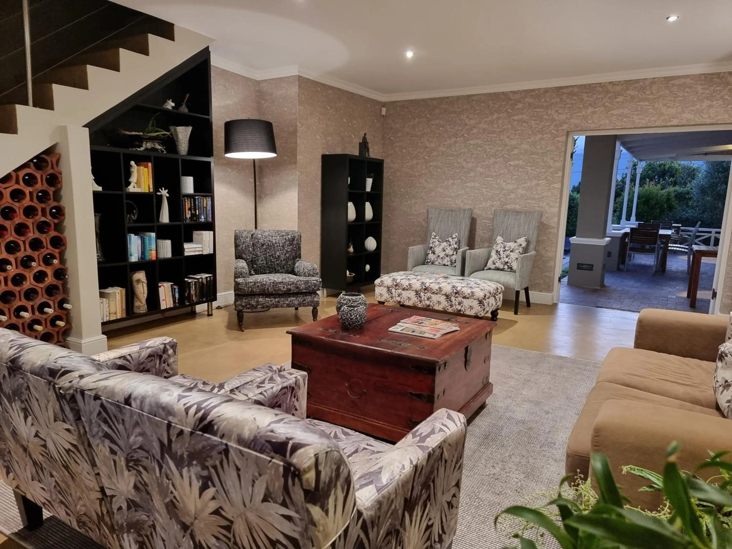 Communal lounge/ TV room in Plumwood Boutique Hotel by The Living Journey Collection