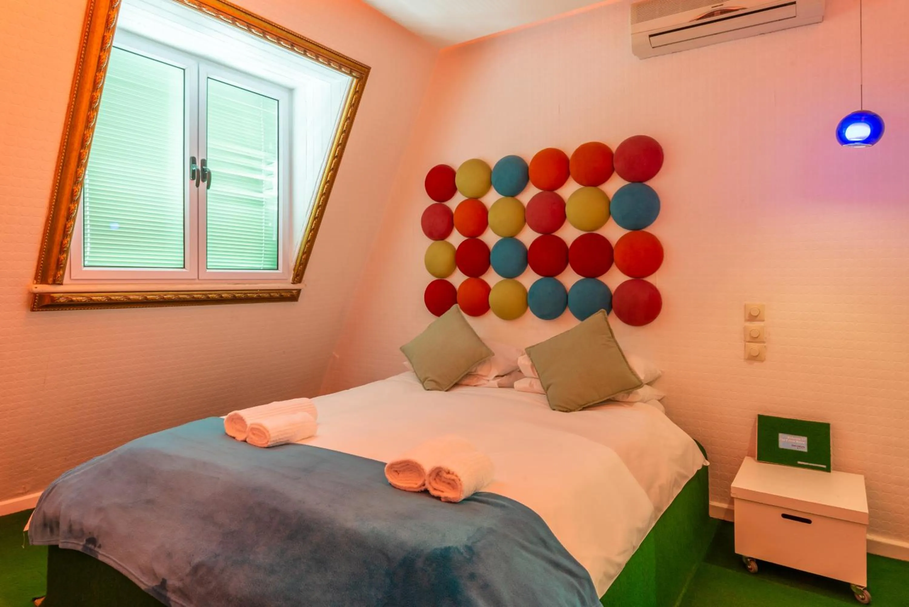 air conditioner, Bed in Daddy Long Legs Art Hotel