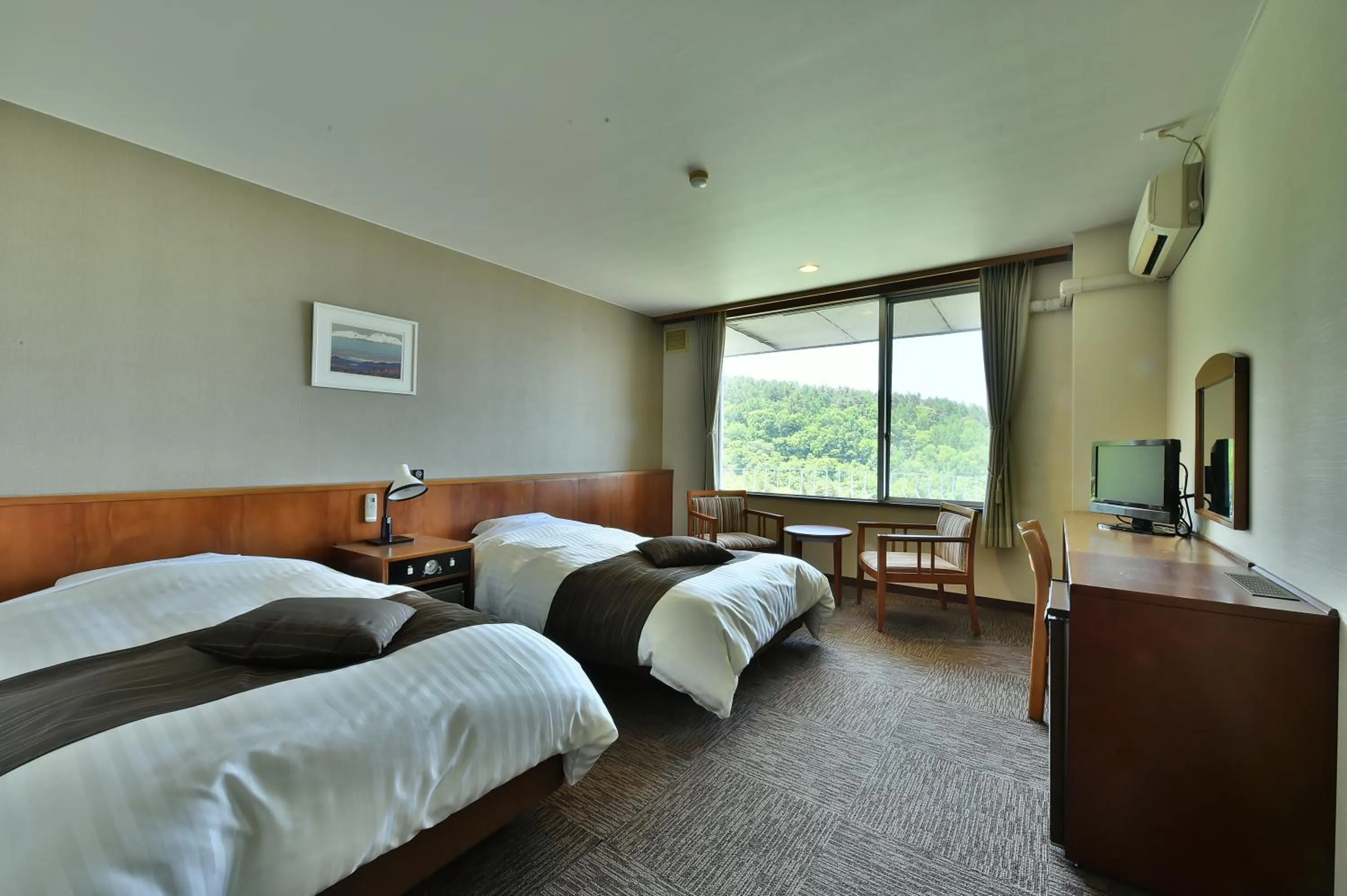 Bed in Tateshina Park Hotel