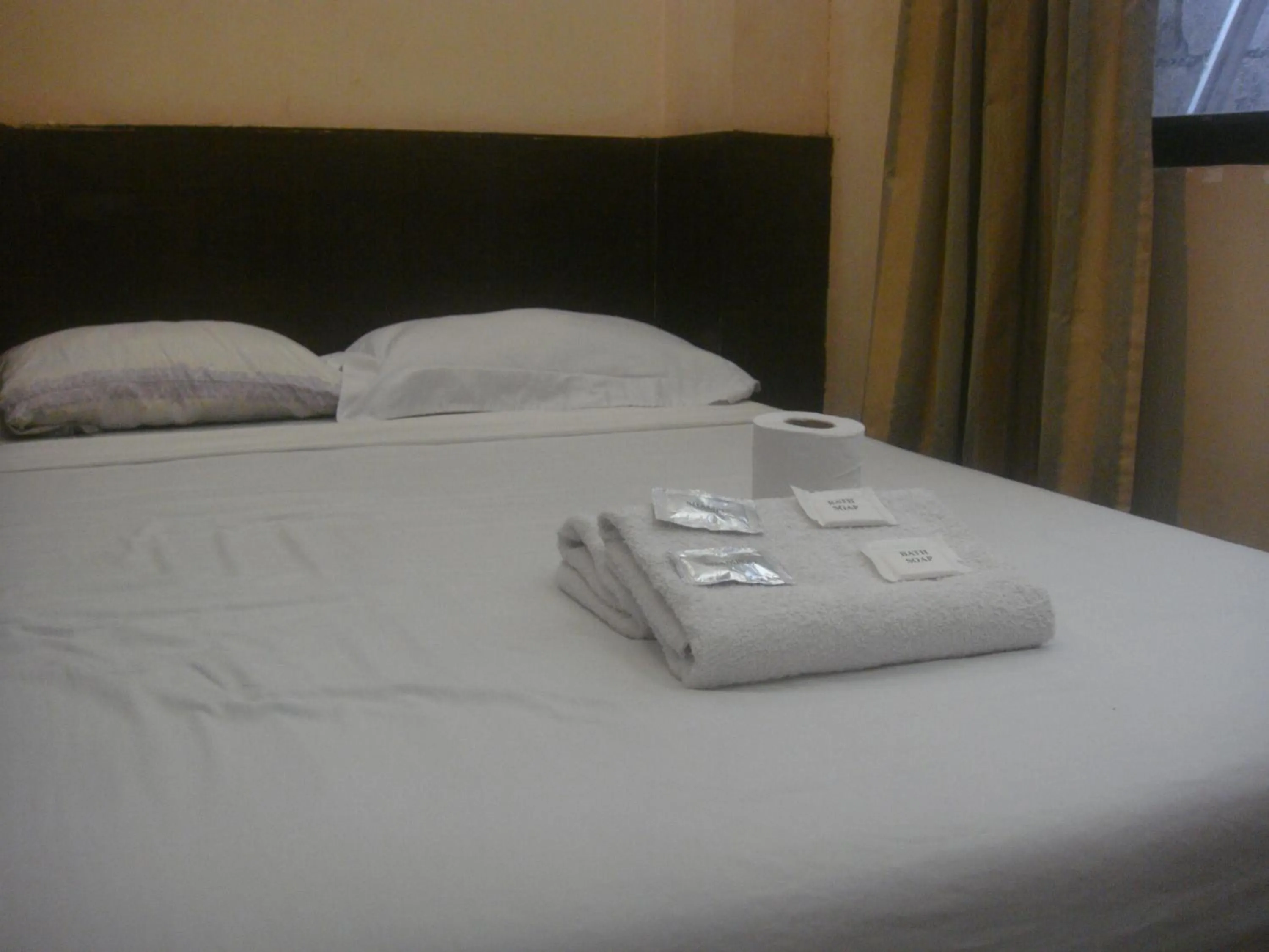 Bed in Hidden Pearl Hotel (Janus Luxury Suites)
