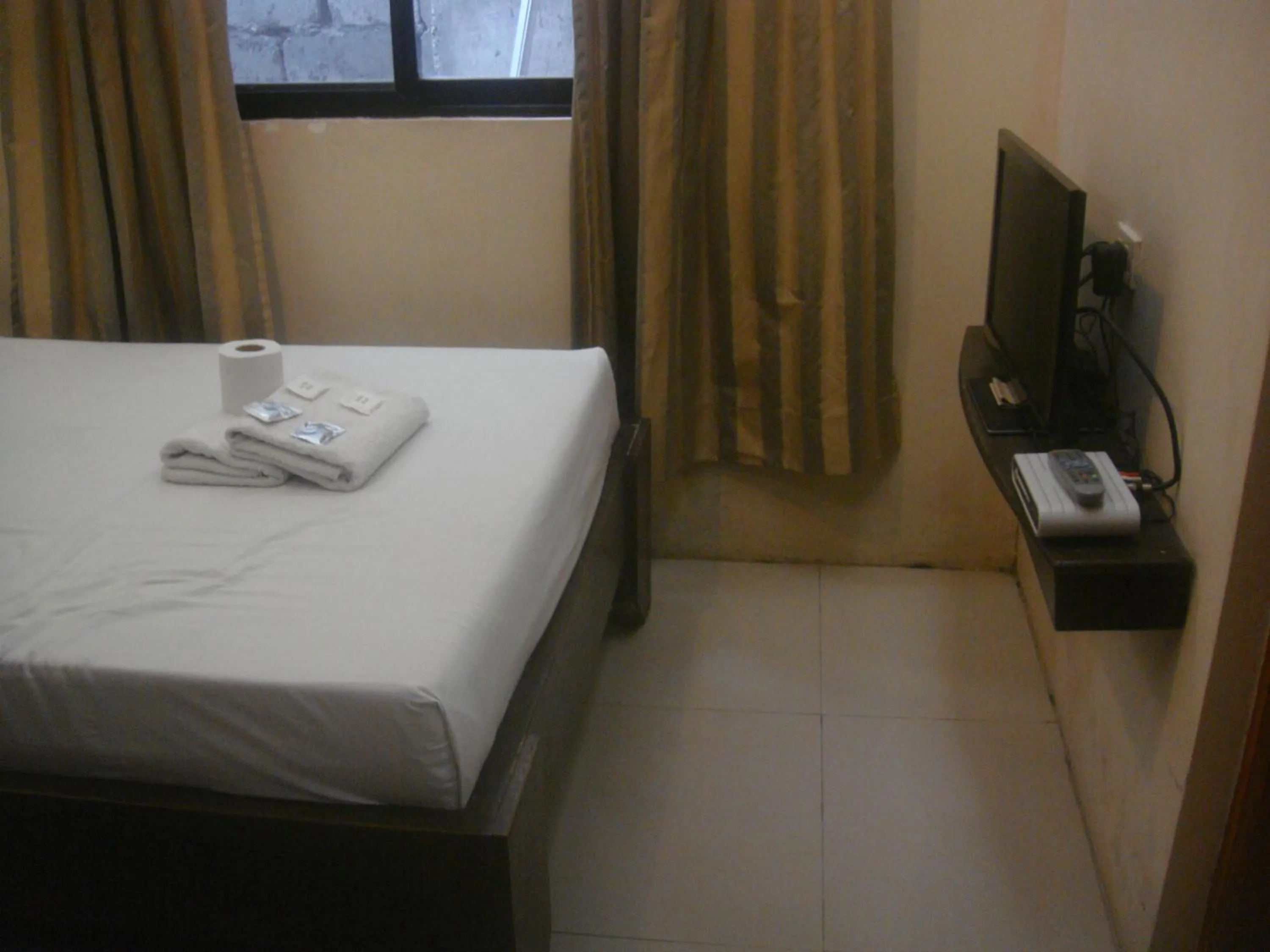 Decorative detail, Bed in Hidden Pearl Hotel (Janus Luxury Suites)